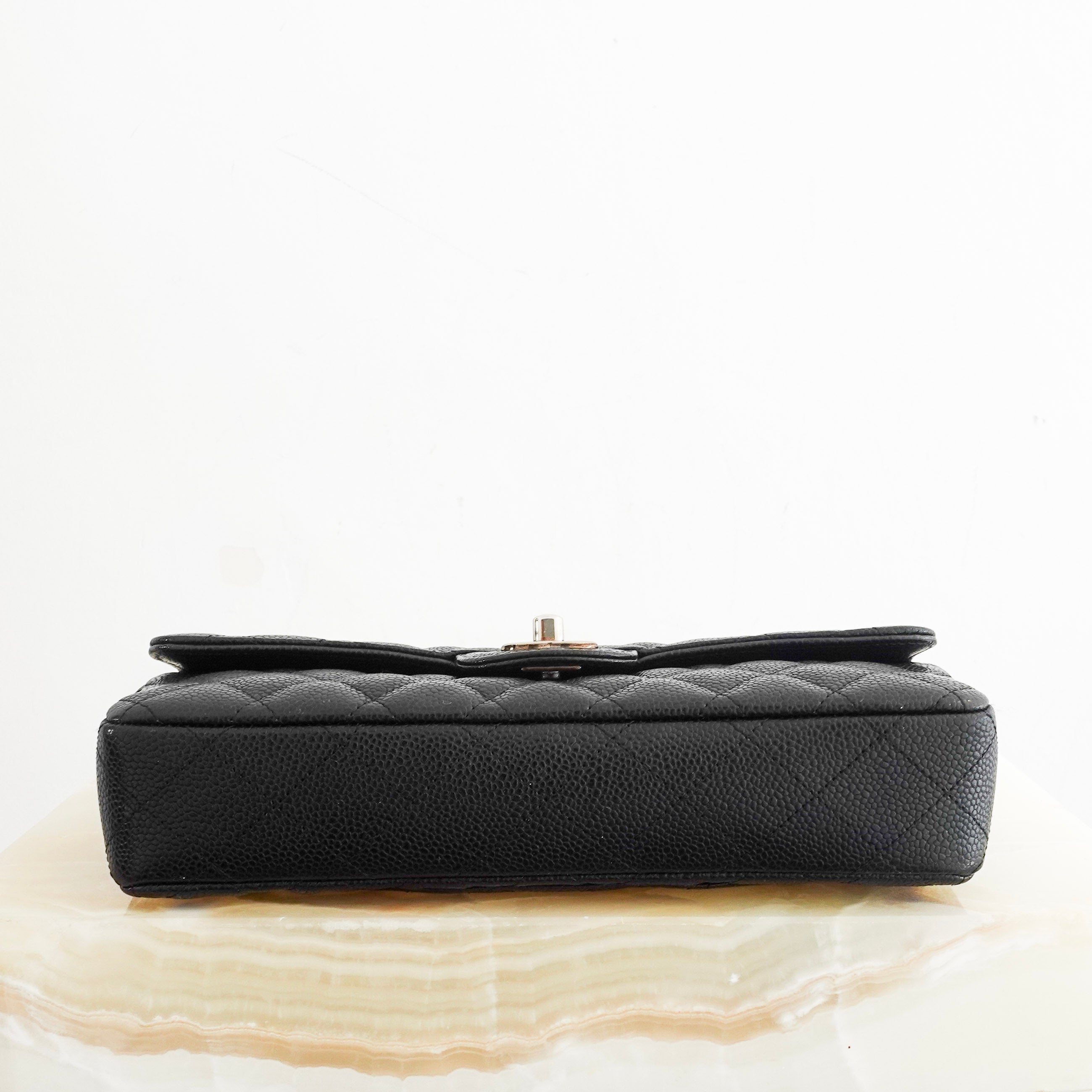 East West shoulder bag caviar