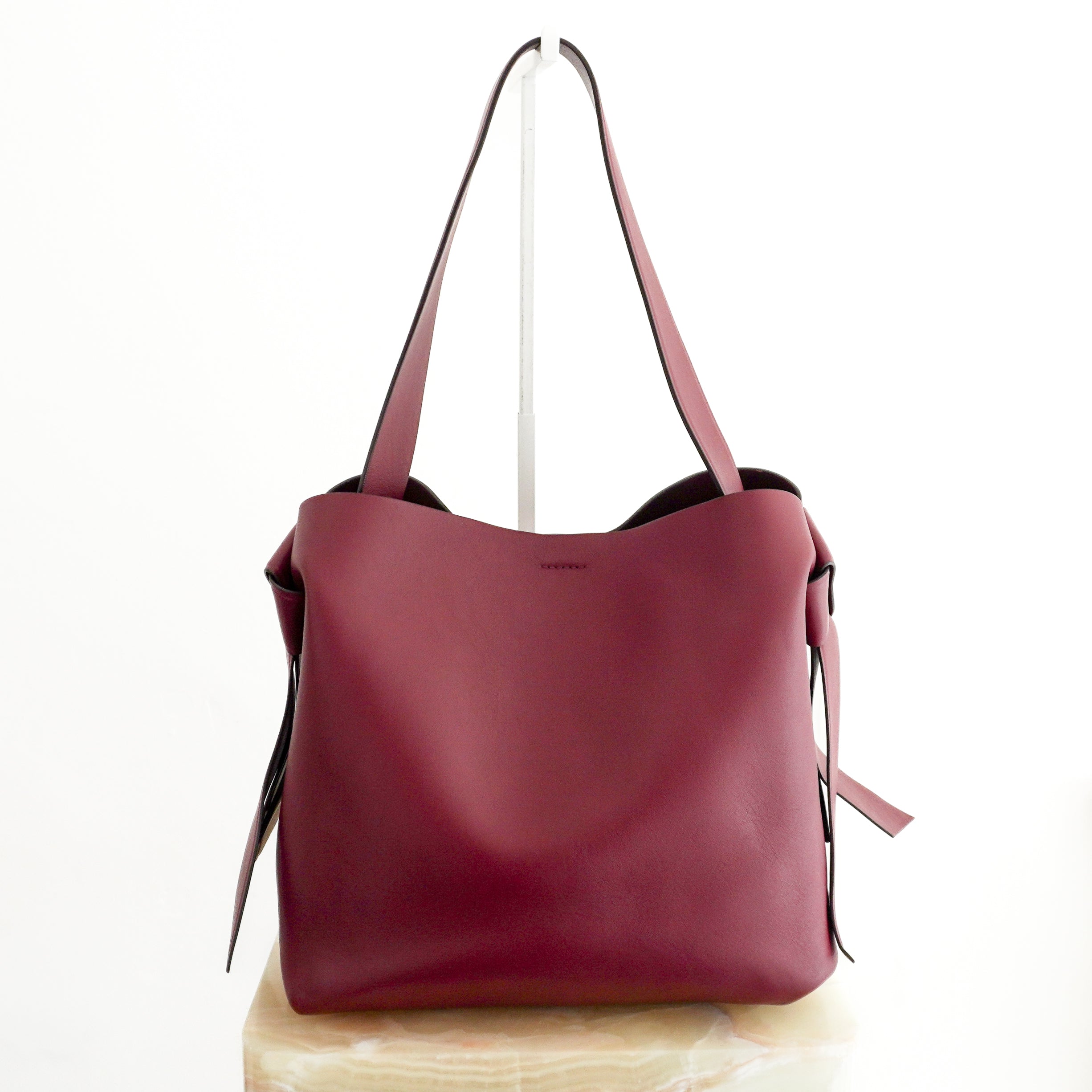 Acne Studios Medium Musubi Leather Tote Bag in Burgundy back photo chelsea london