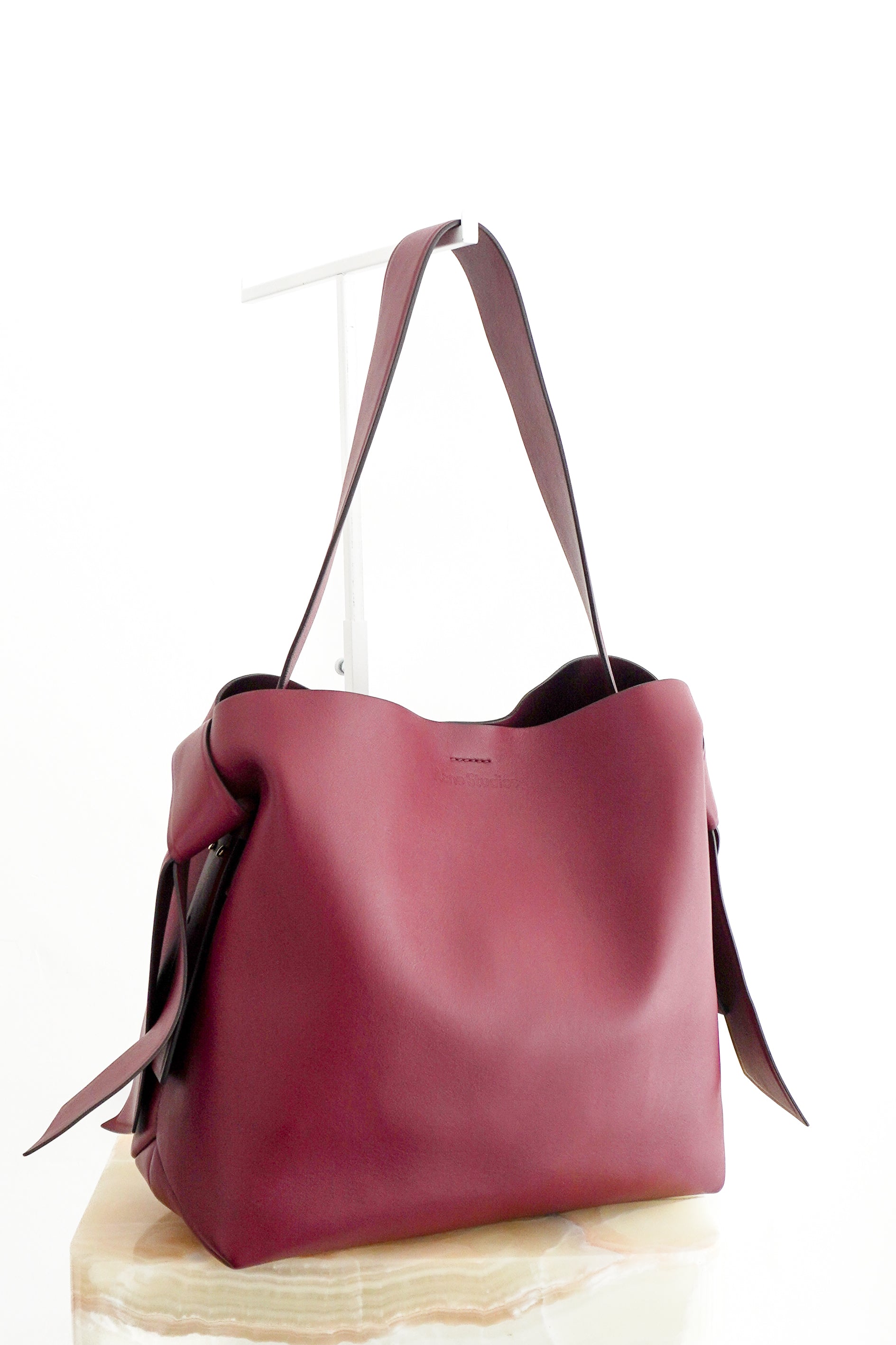 Acne Studios Medium Musubi Leather Tote Bag in Burgundy front photo chelsea london