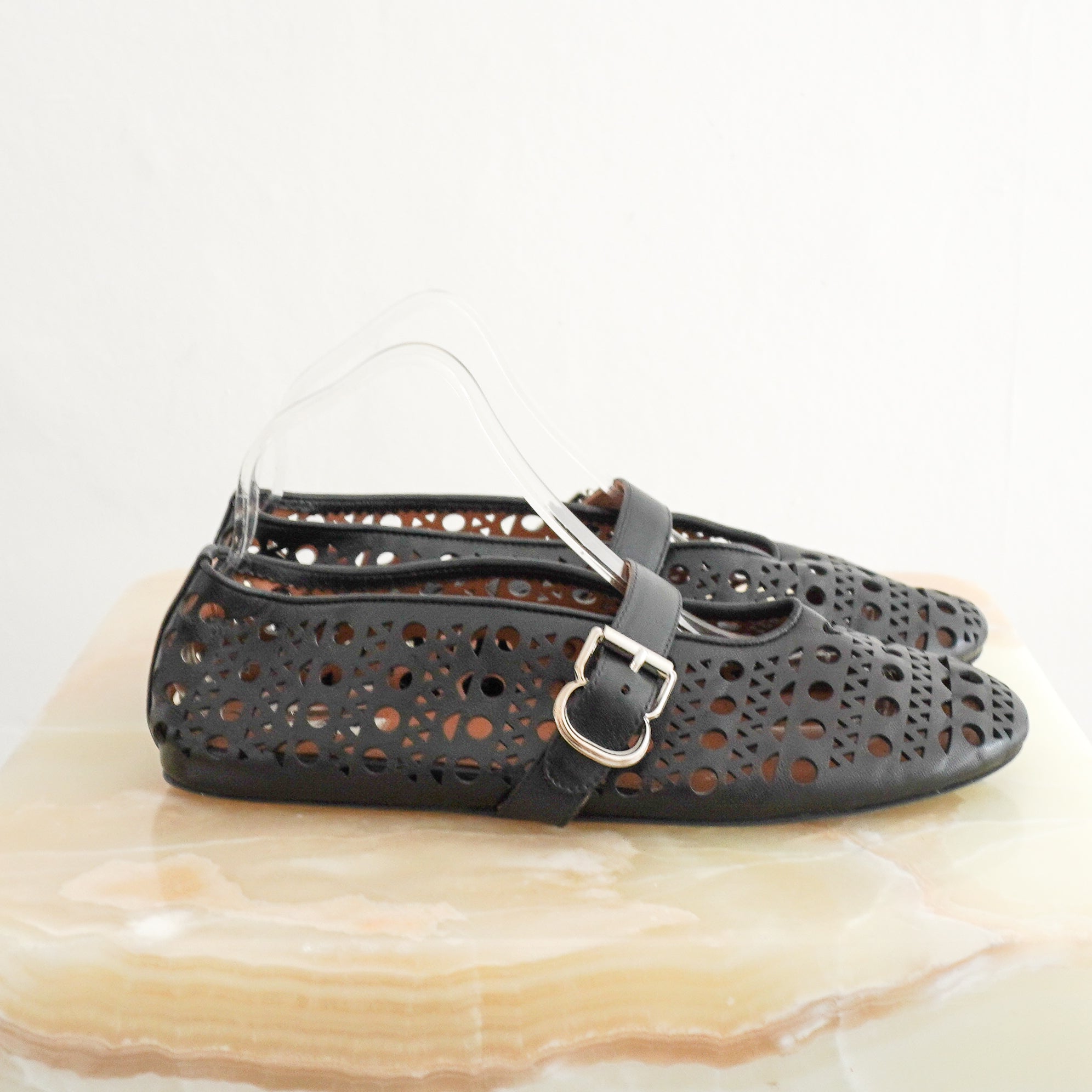 Alaïa Black Vienne Laser-Cut Lambskin Ballet Flats side photo chelsea london