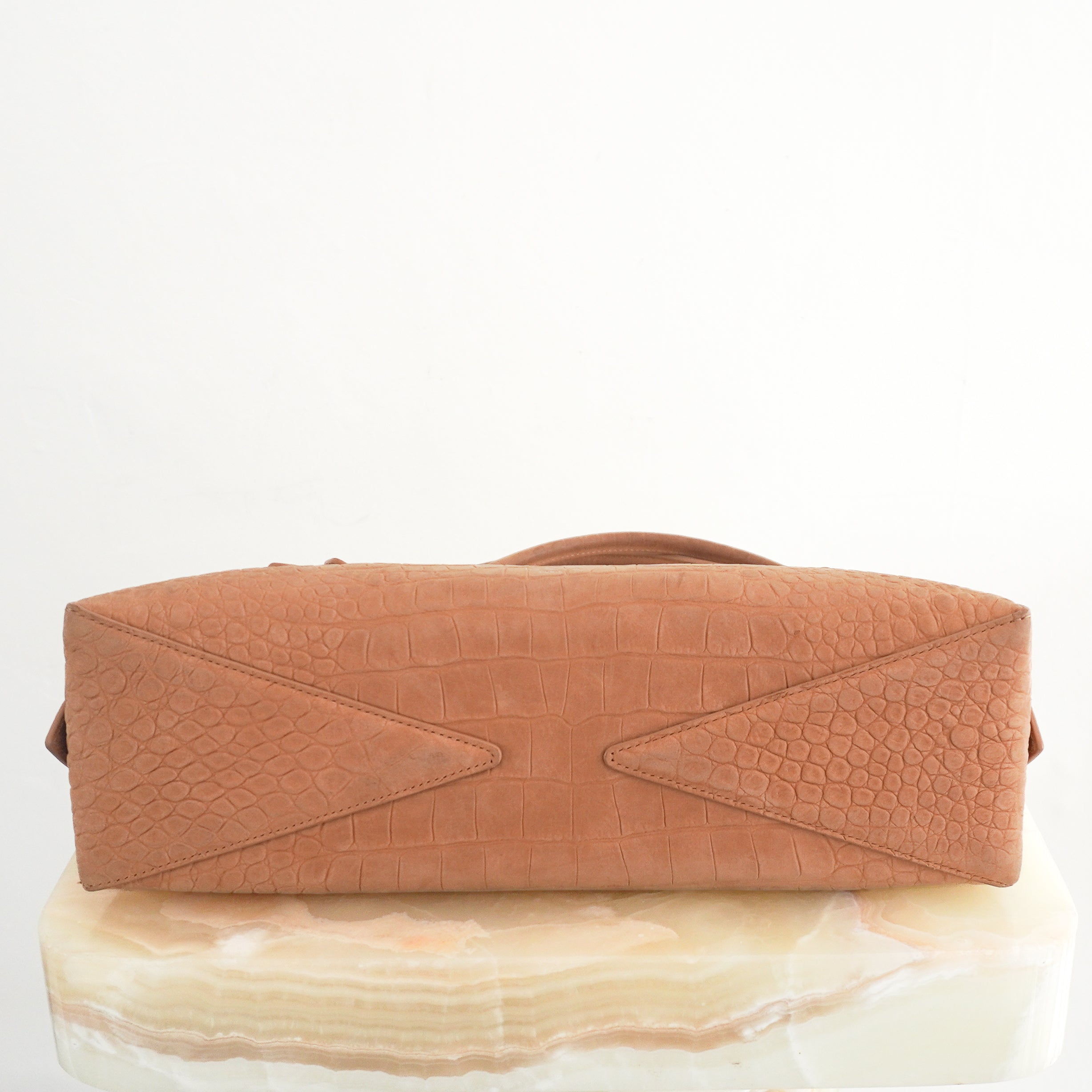 Alaïa Le Teckel Medium Croc-Embossed Suede Shoulder Bag Beige bottom photo chelsea london