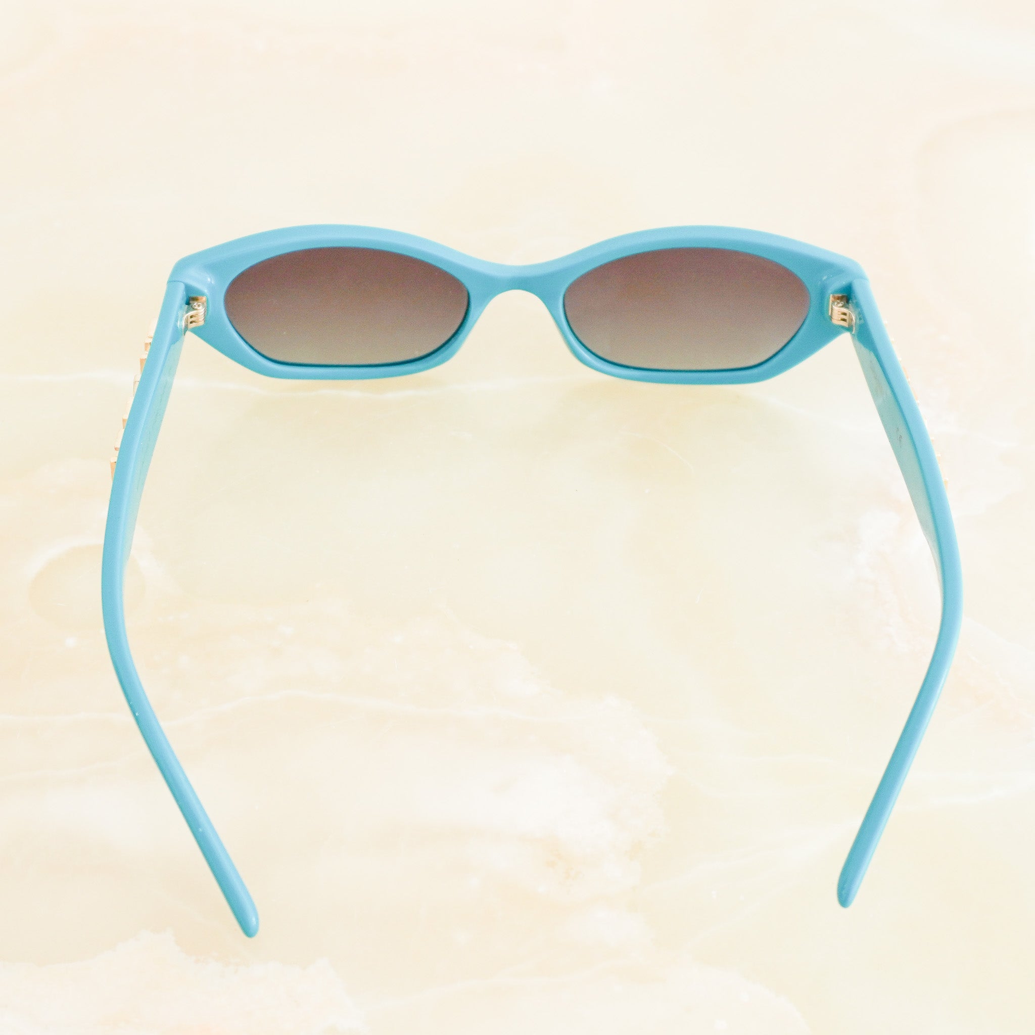 Back image of the Chanel x Pharrell Williams Teal Sunglasses