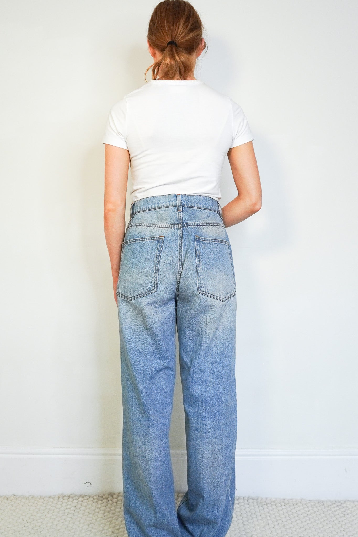 Back image of the NEW The Row Carlton Jeans
