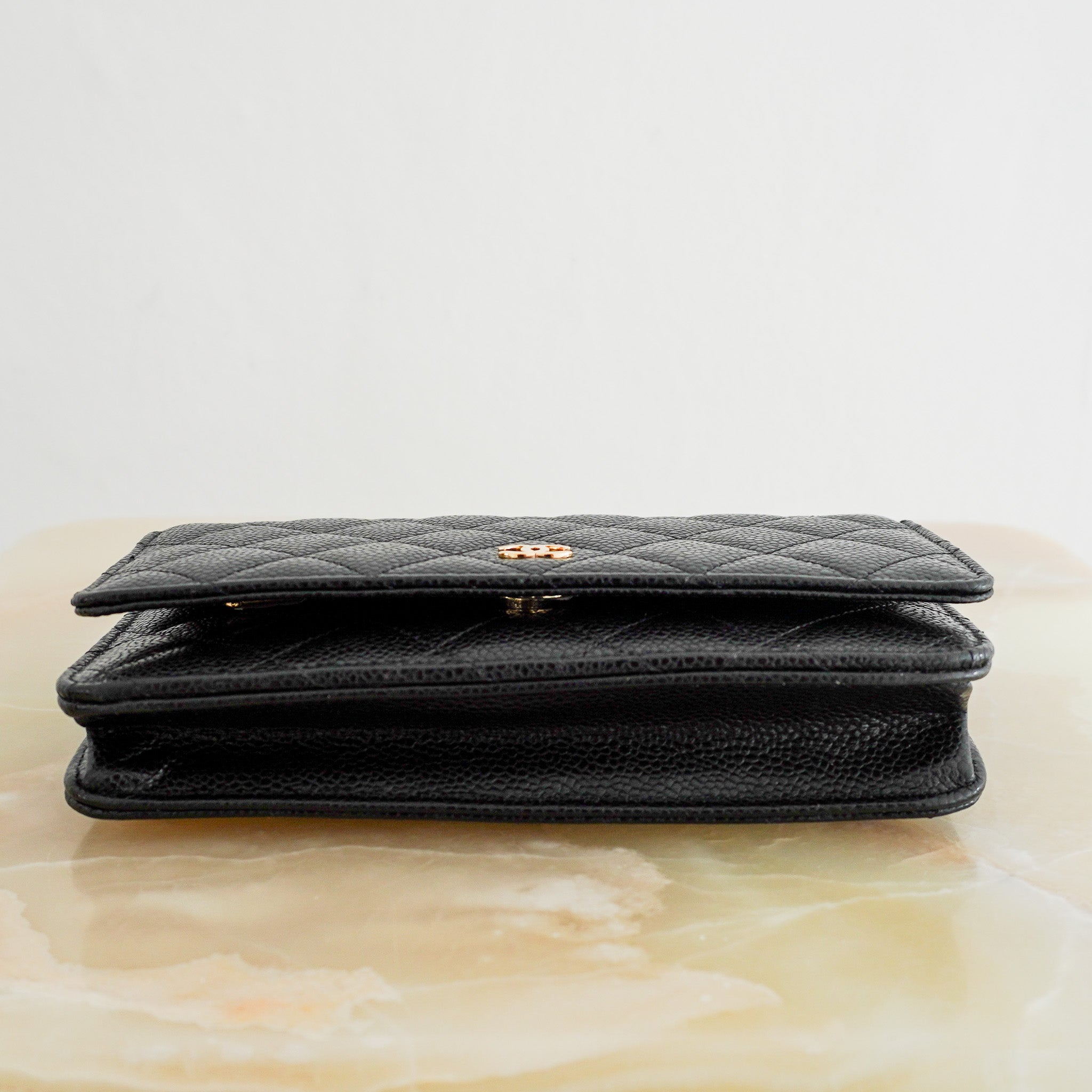 Back picture of the Chanel Wallet on Chain Black Caviar Leather & Gold Hardware