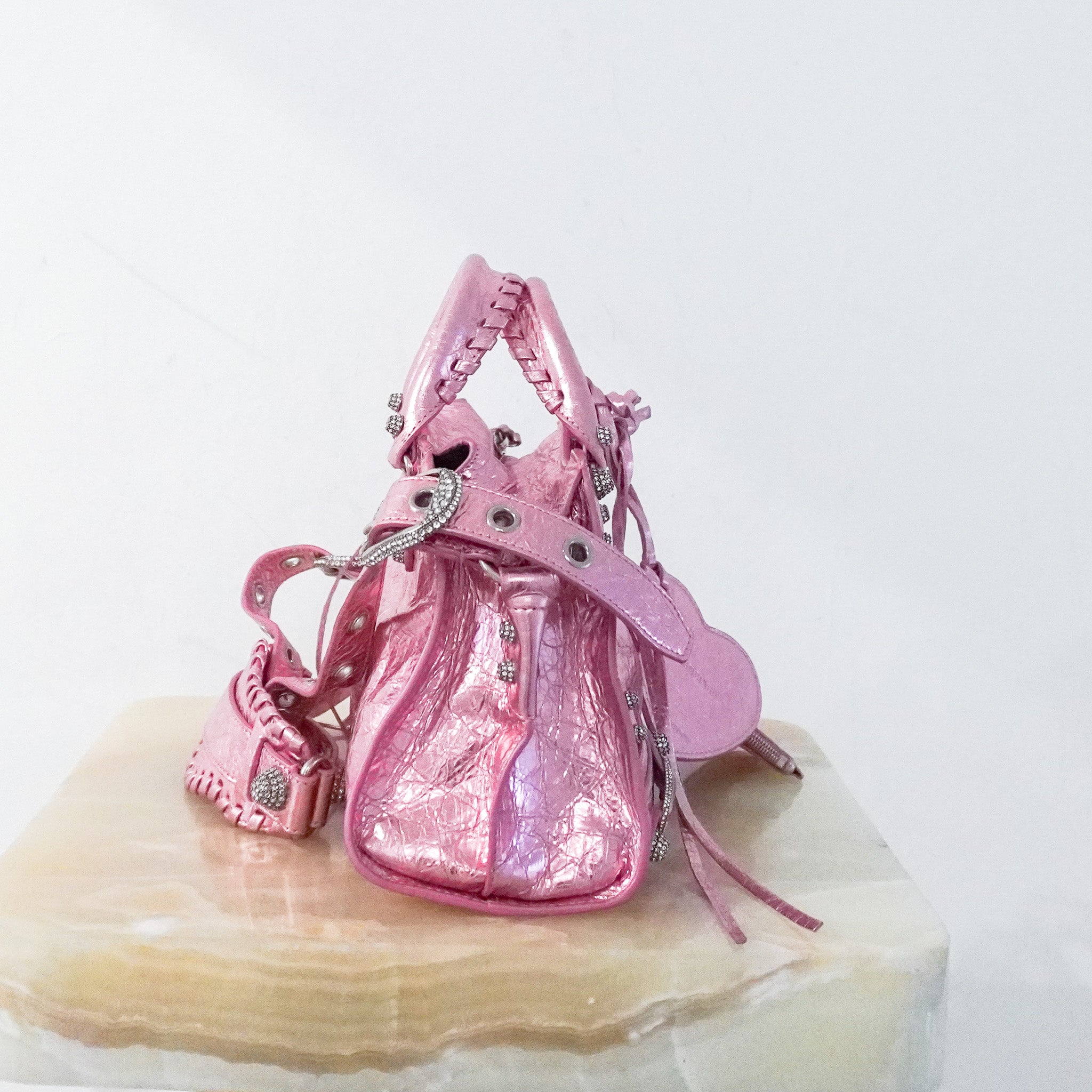 Balenciaga-Neo-Cagole-XS-Bag-in-Metallic-Pink-side-picture