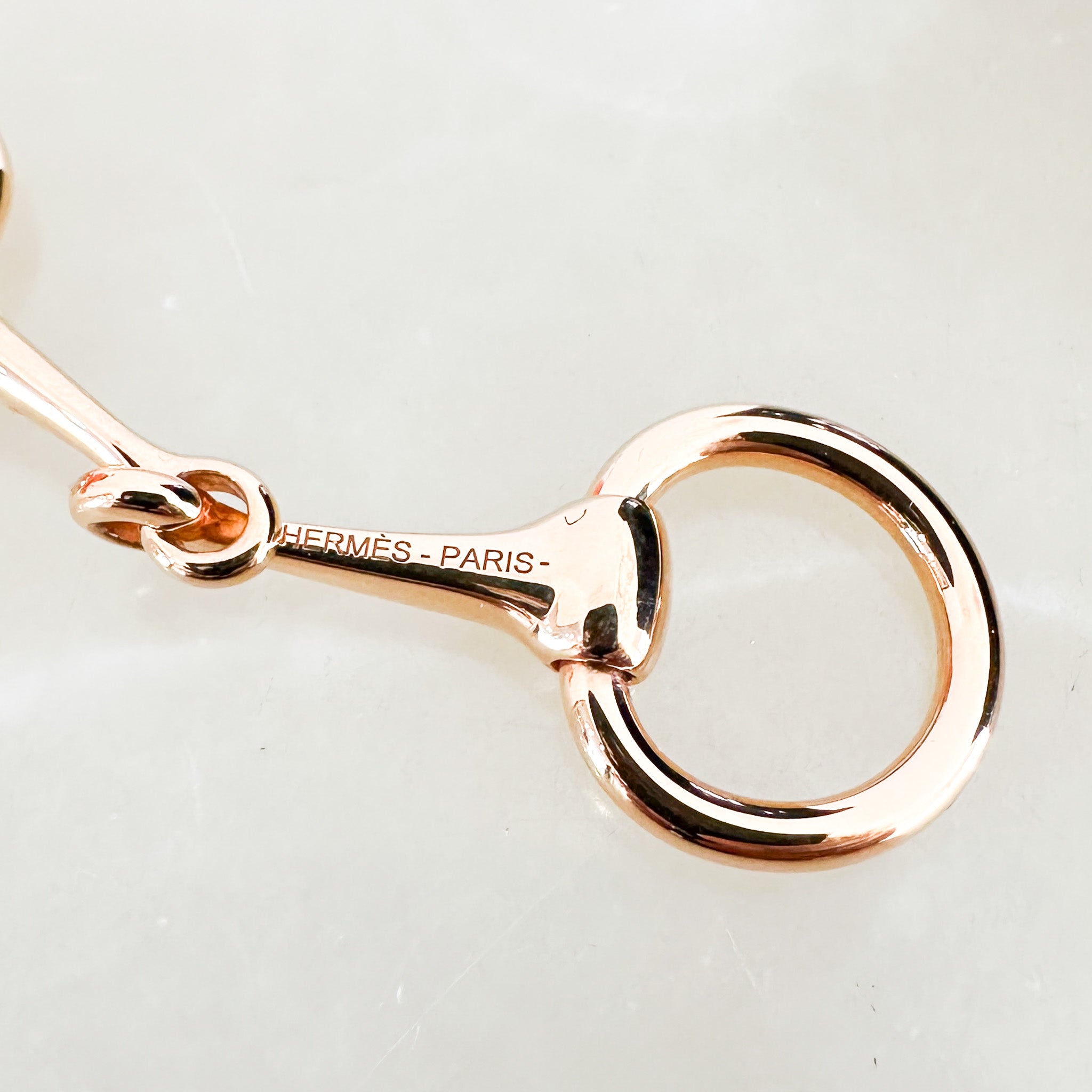 CURRENT-SEASON-Hermes-Mini-Mors-Twilly-Ring-in-Plaqué-Or-Rose-side-picture