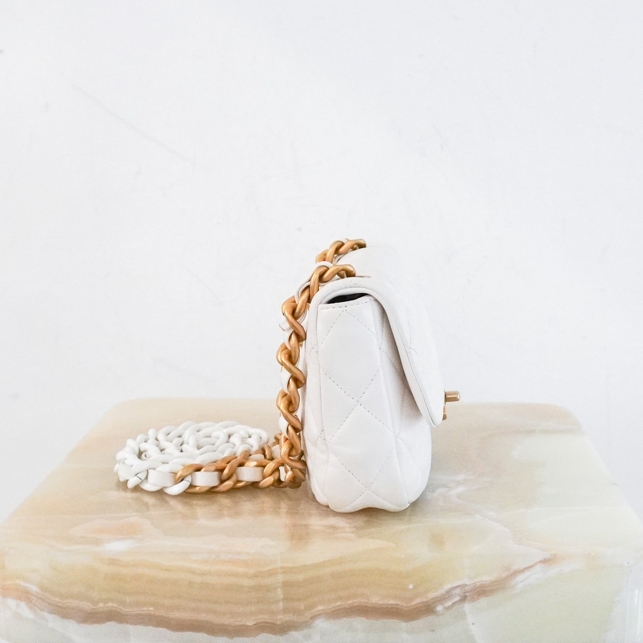 Chanel-White-Lambskin-Flap-Bag-side-picture