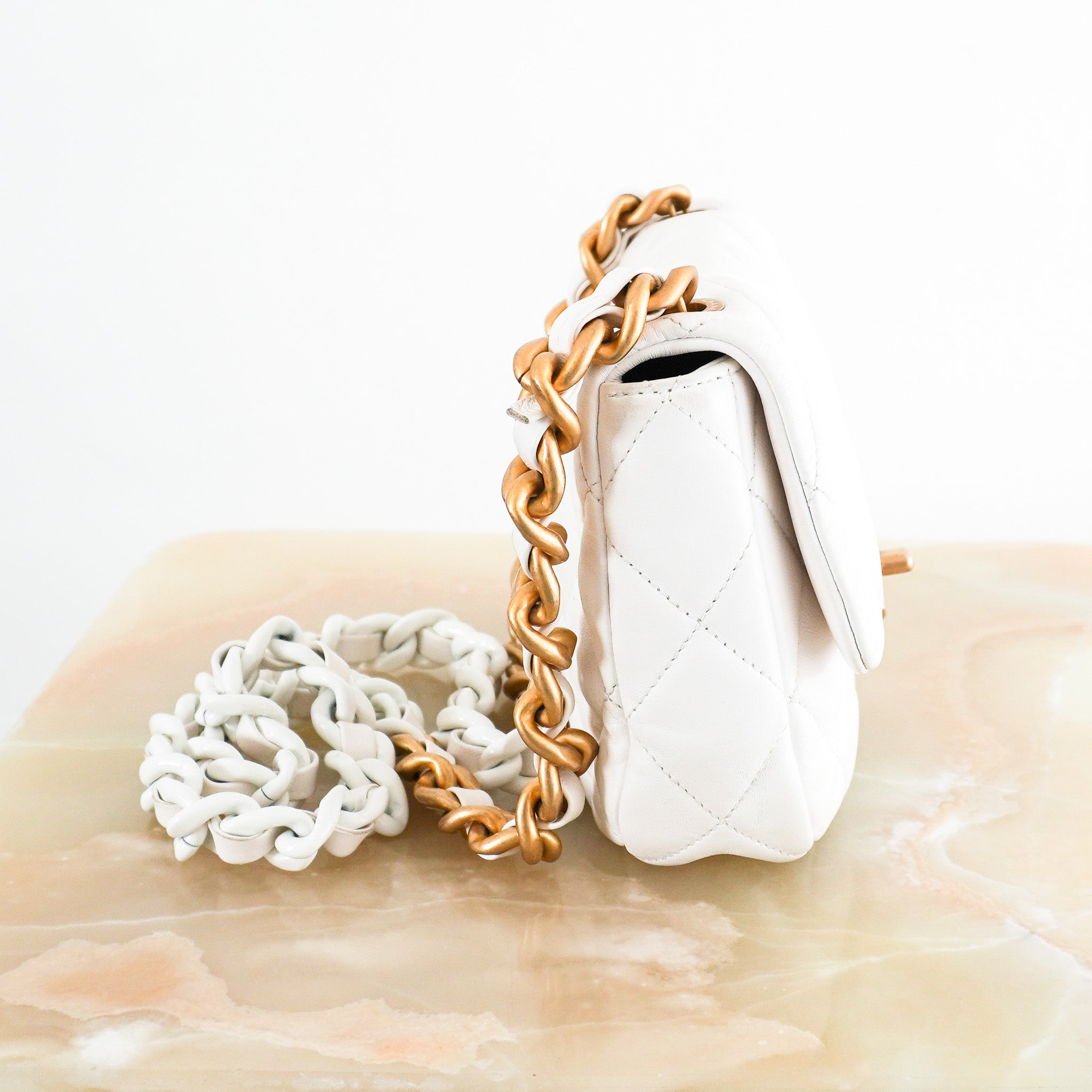 Chanel-White-Lambskin-Flap-Bag-side-picture