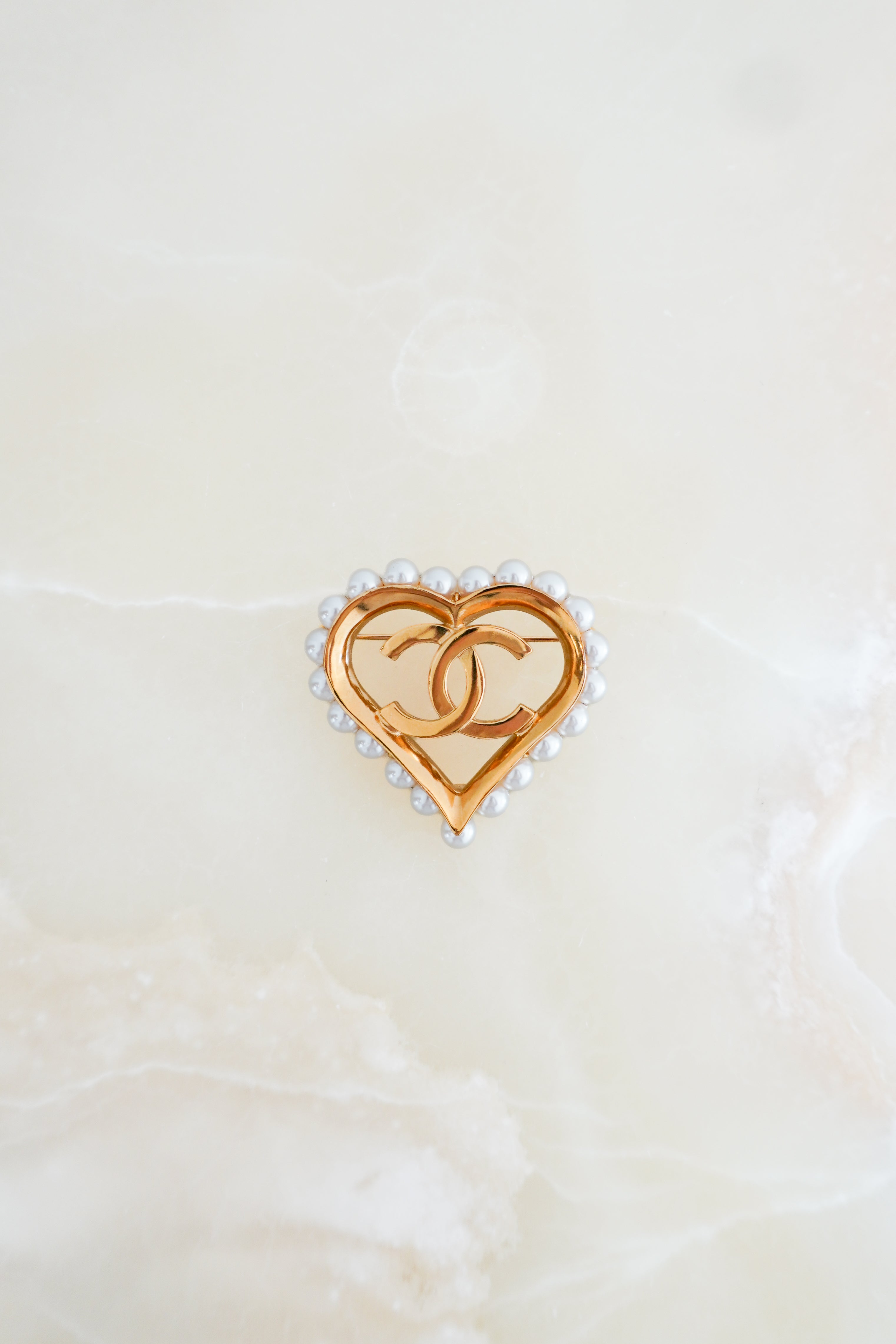 Chanel CC Heart Pearl Brooch in Gold-Tone Metal front photo chelsea london