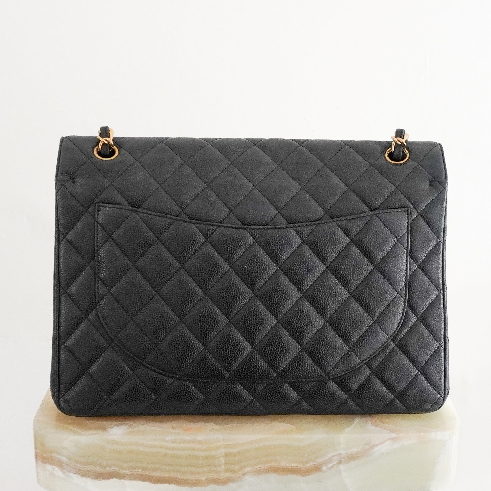 Chanel Jumbo Classic Double Flap Bag in Black Caviar Leather back photo chelsea london