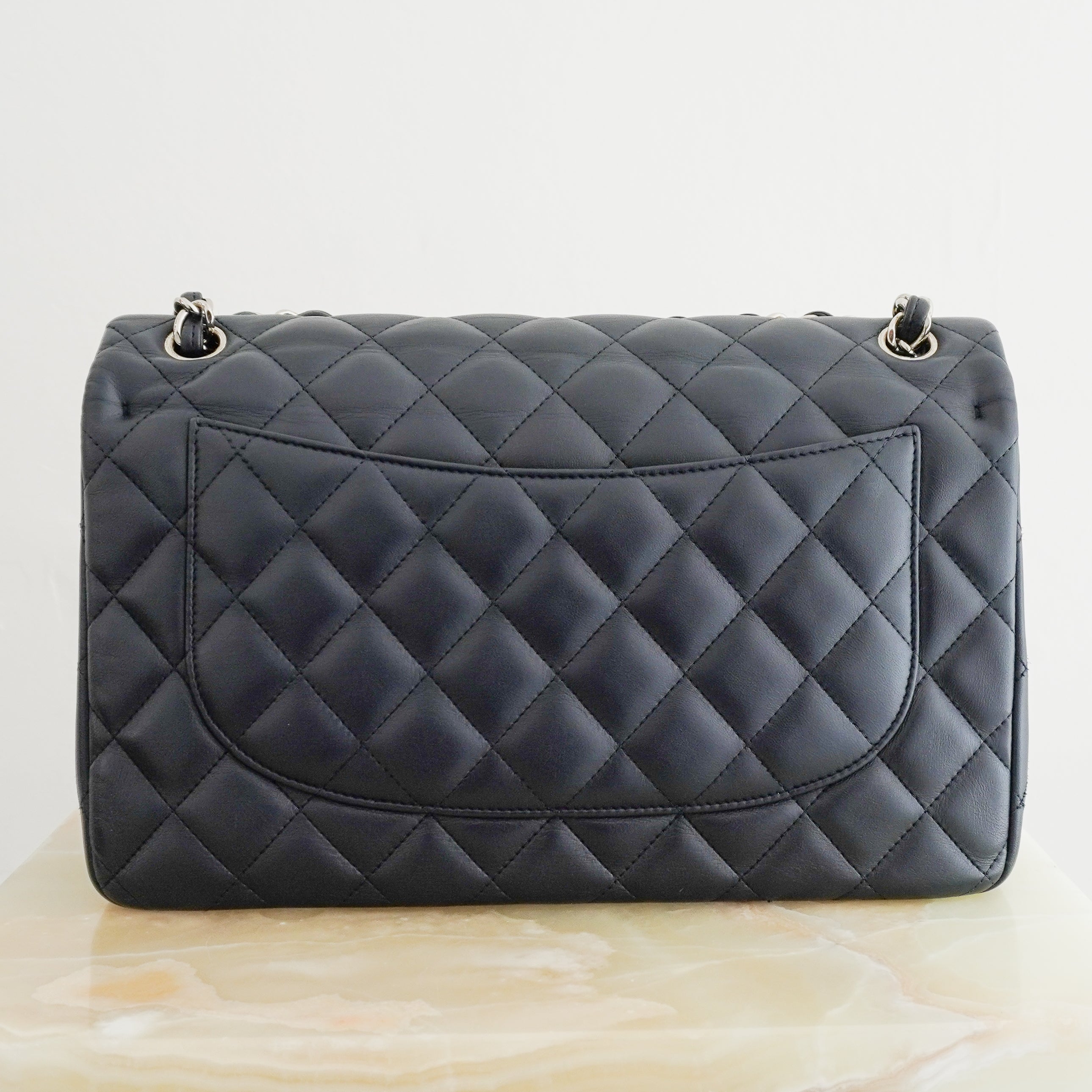 Chanel Large Classic Double Flap Bag Navy Lambskin with Silver Hardware back photo chelsea london