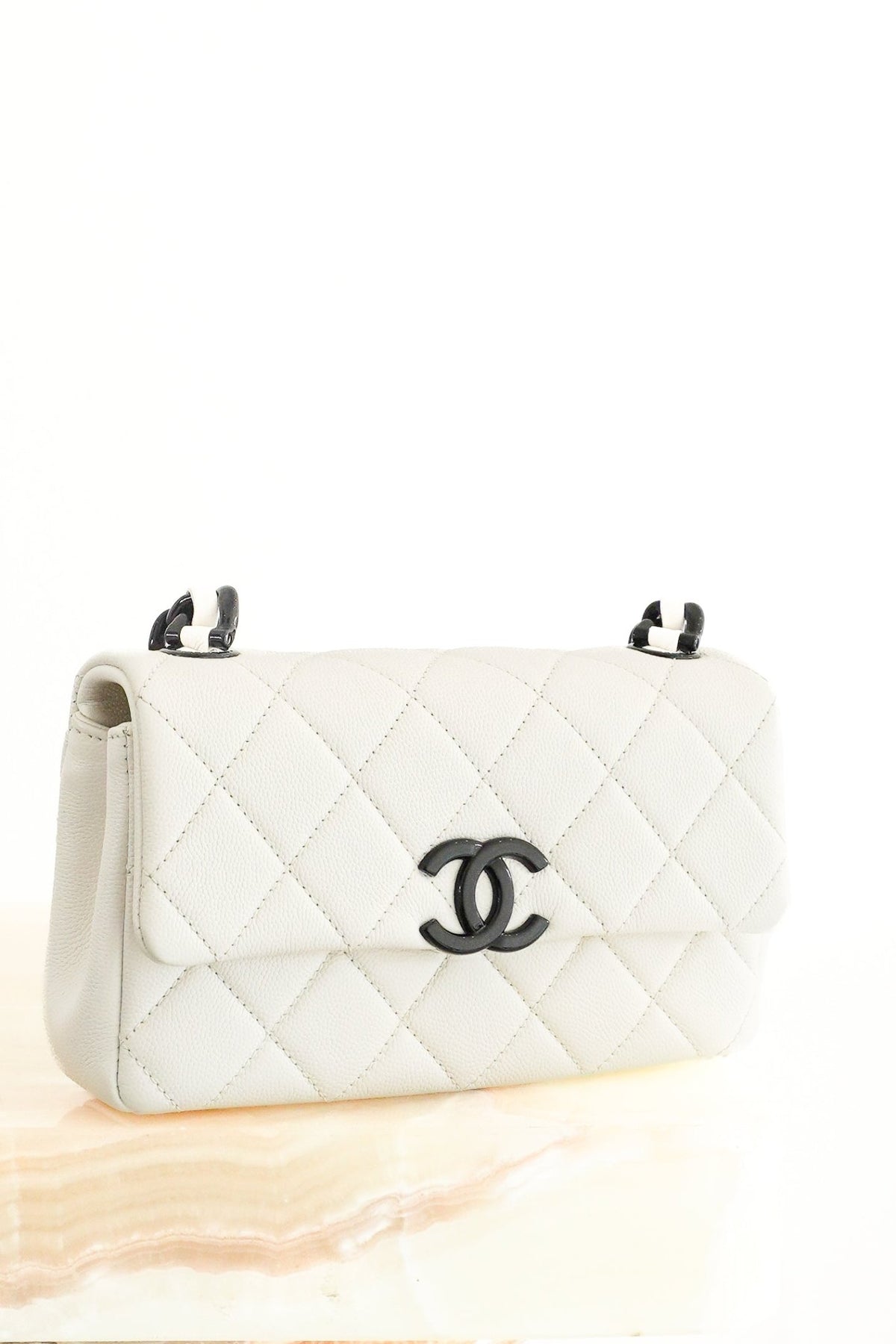 Chanel Quilted Flap Bag in Ivory Caviar Leather | Authentic Preloved - Reloved Again