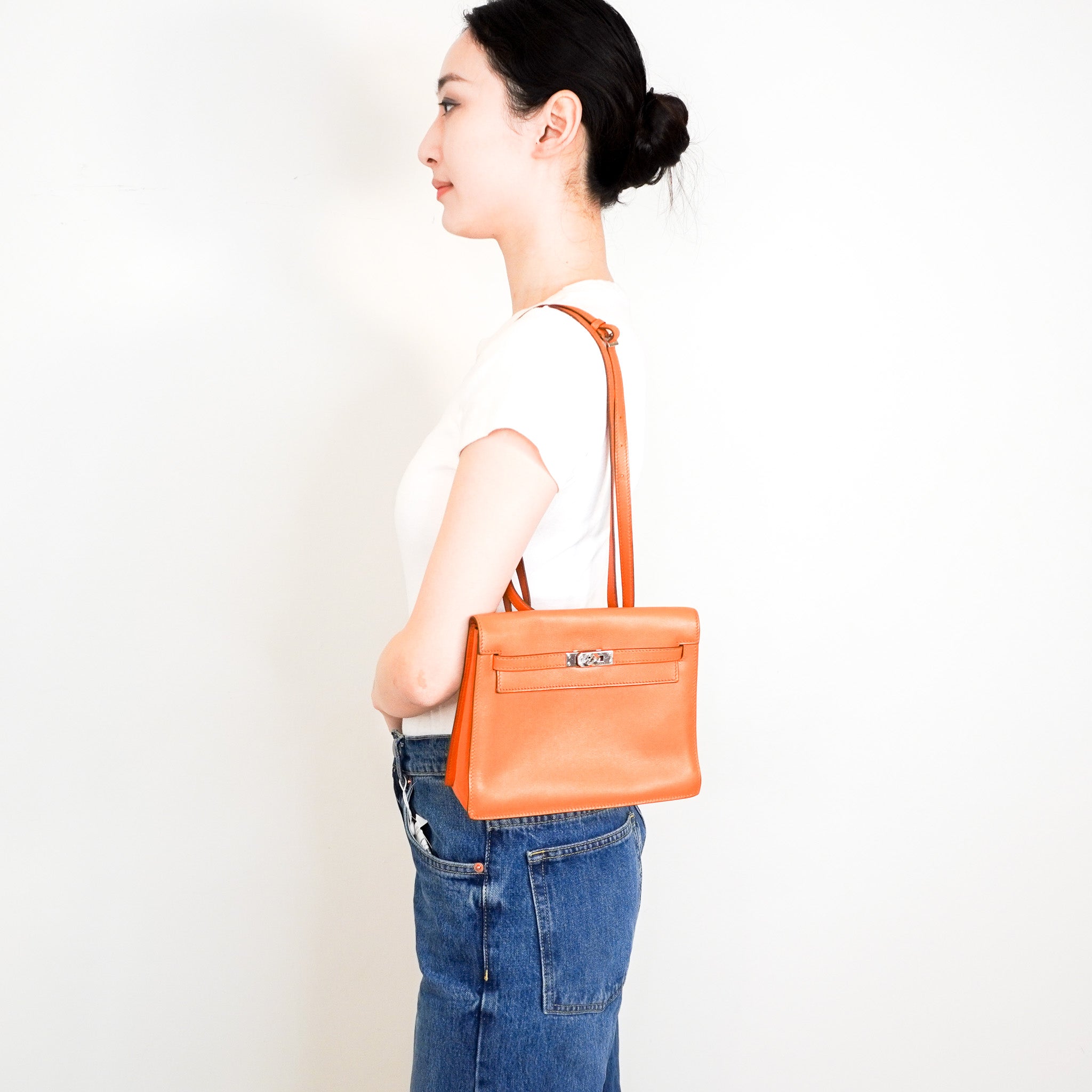 Hermès Kelly Danse Orange in Swift Leather | Authentic Preloved - Reloved Again