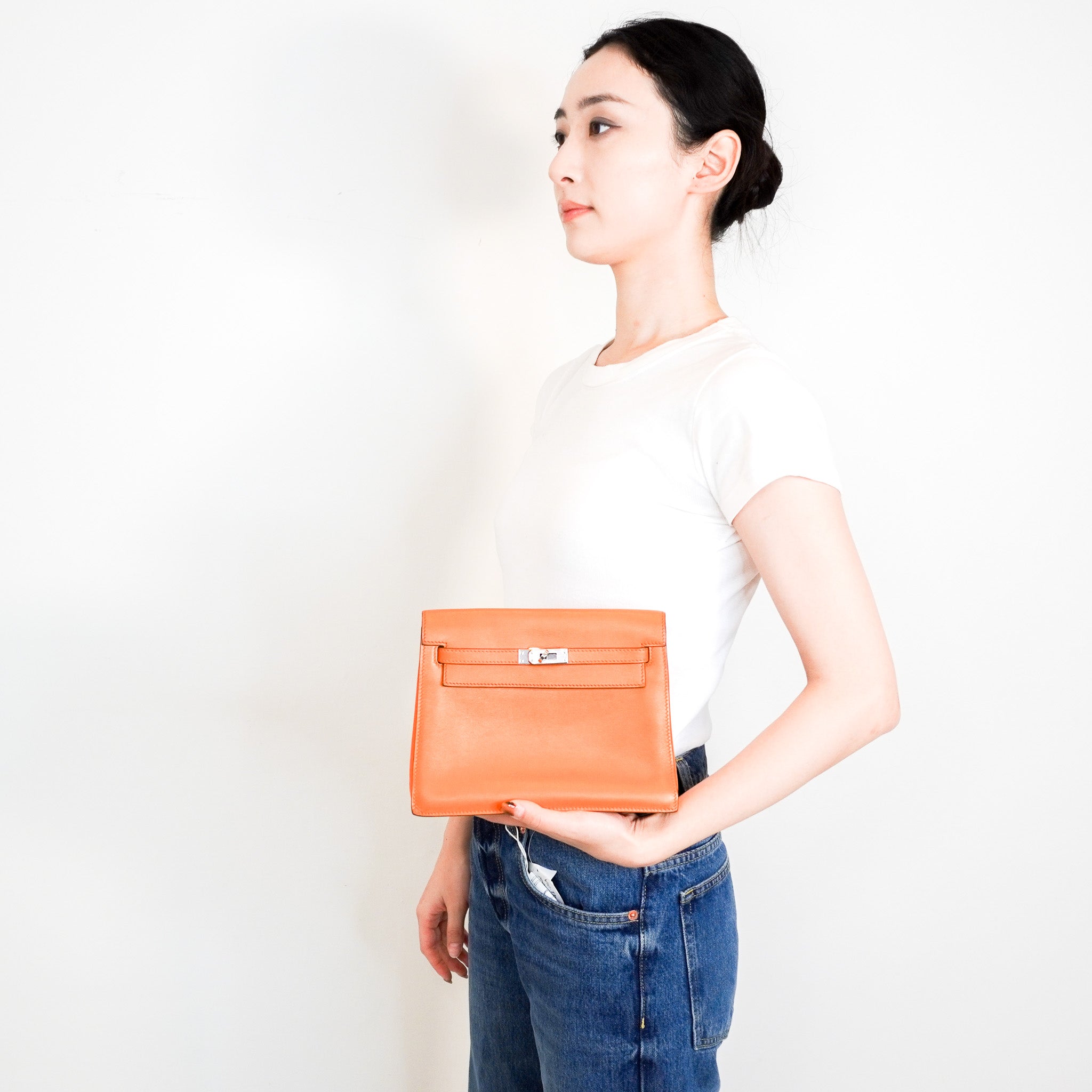 Hermès Kelly Danse Orange in Swift Leather | Authentic Preloved - Reloved Again