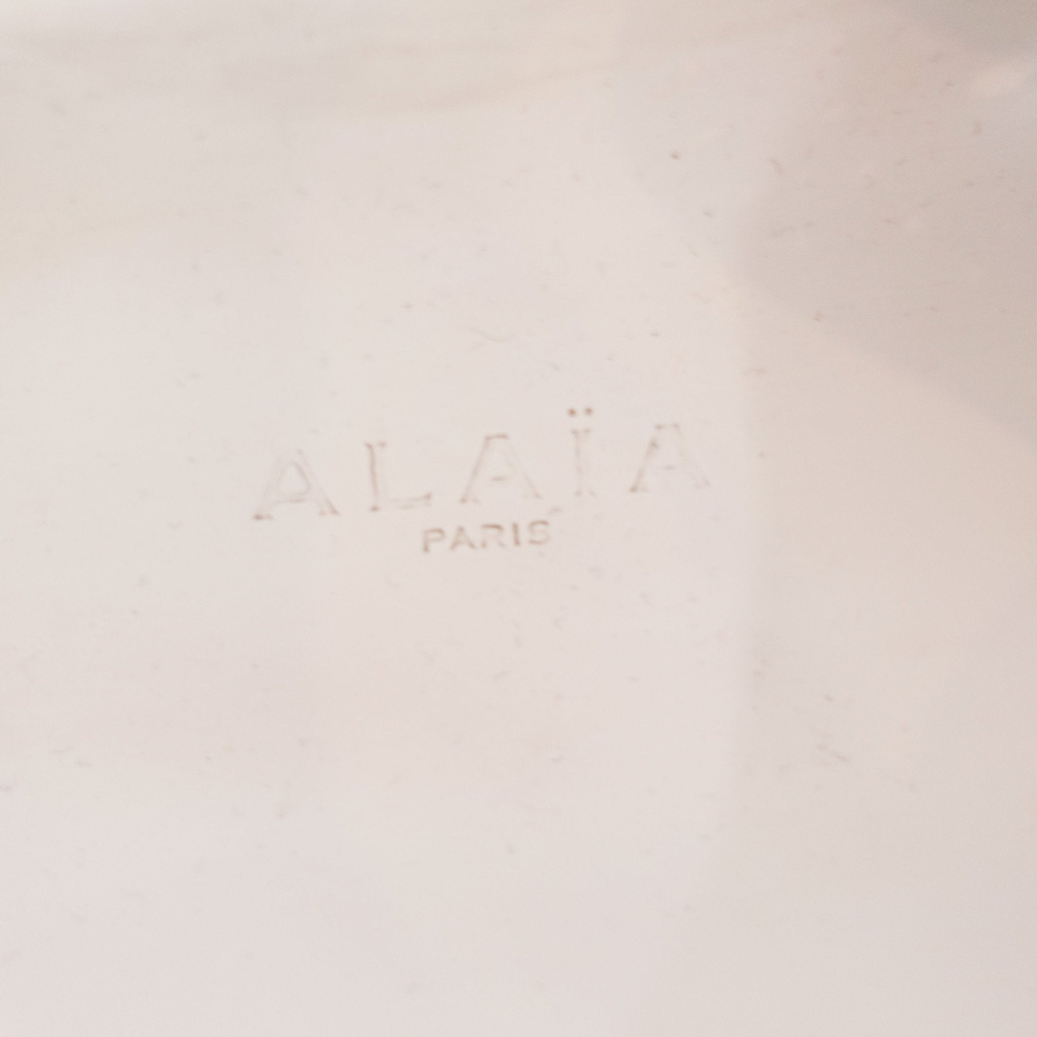 Alaia Perforated Sliders in white RRP £750 | Authentic Preloved - Reloved Again