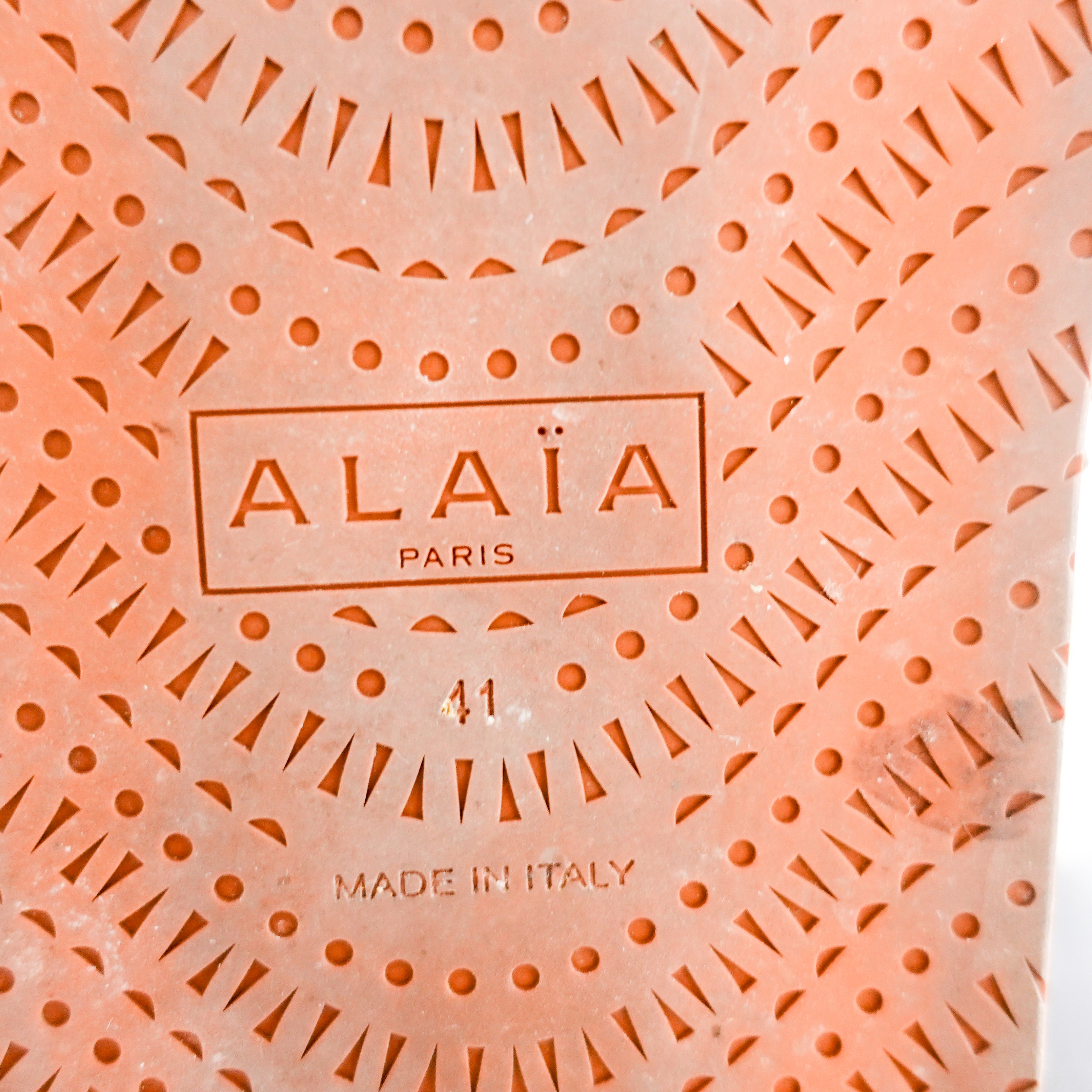 Alaia Perforated Sliders in white RRP £750 | Authentic Preloved