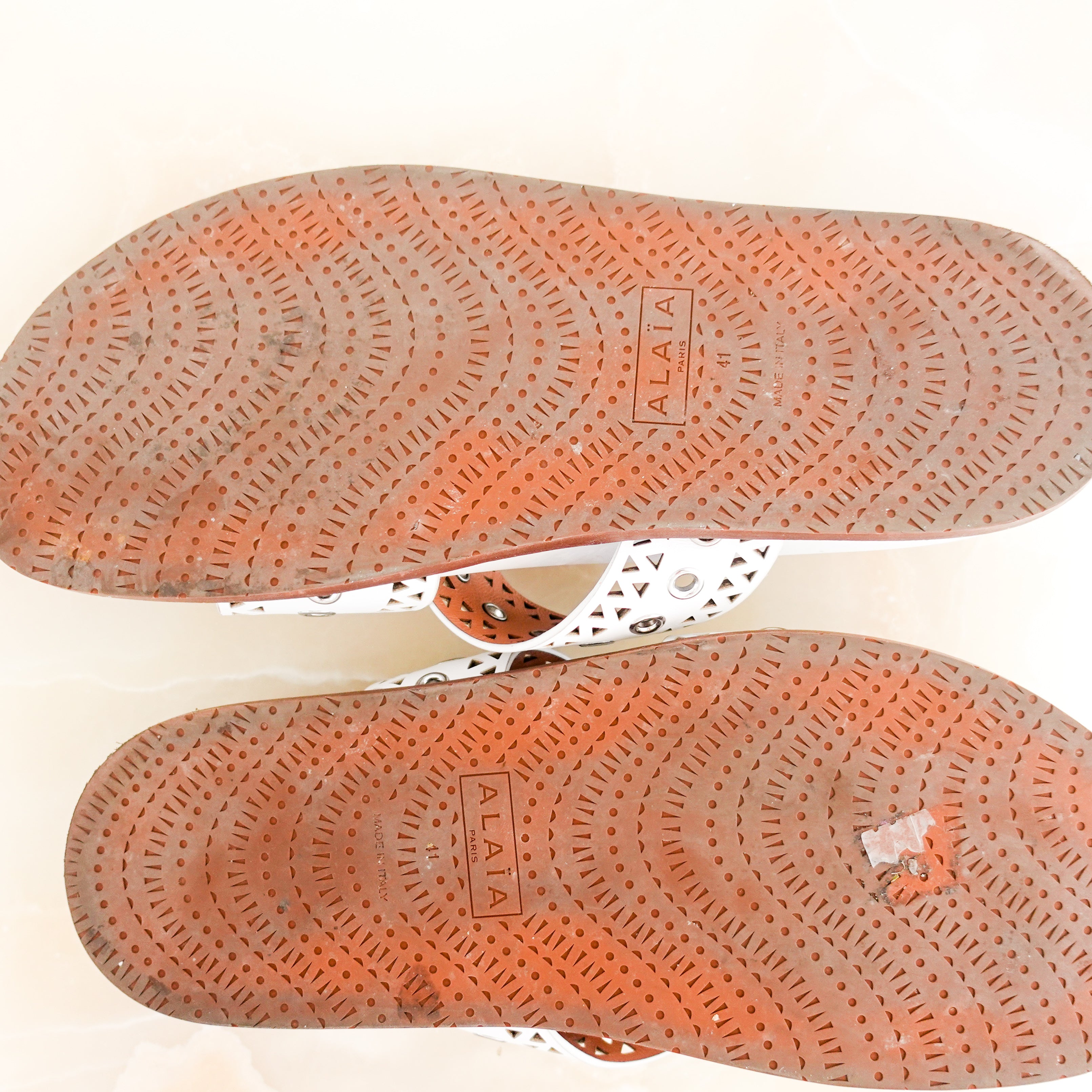 Alaia Perforated Sliders in white RRP £750 | Authentic Preloved
