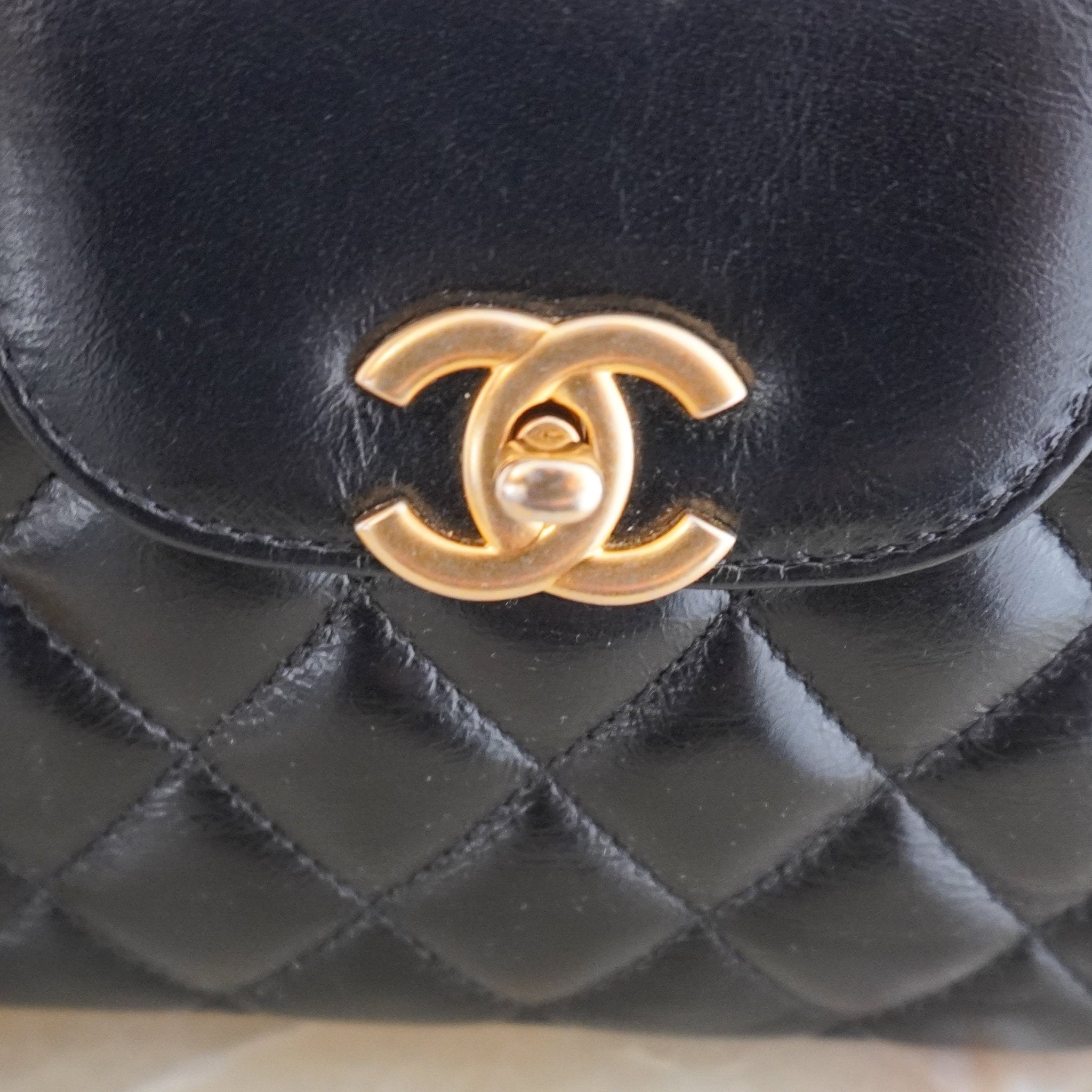 Chanel Small Kelly Re-Edition Top Handle Bag in Black Quilted Lambskin RRP (£4080) | Authentic Preloved - Reloved Again