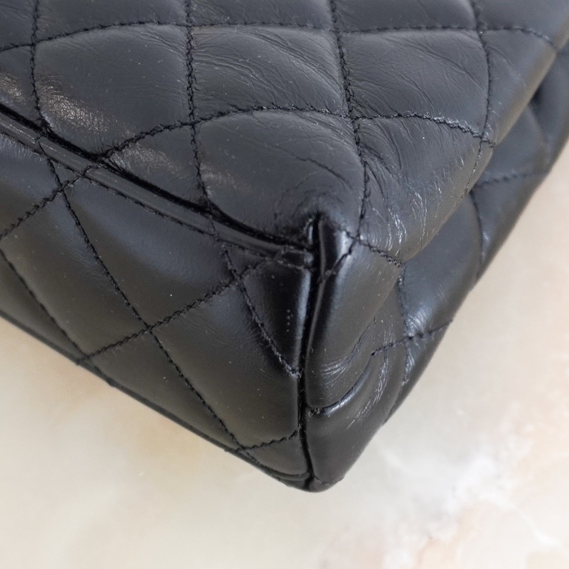 Chanel Small Kelly Re-Edition Top Handle Bag in Black Quilted Lambskin RRP (£4080) | Authentic Preloved