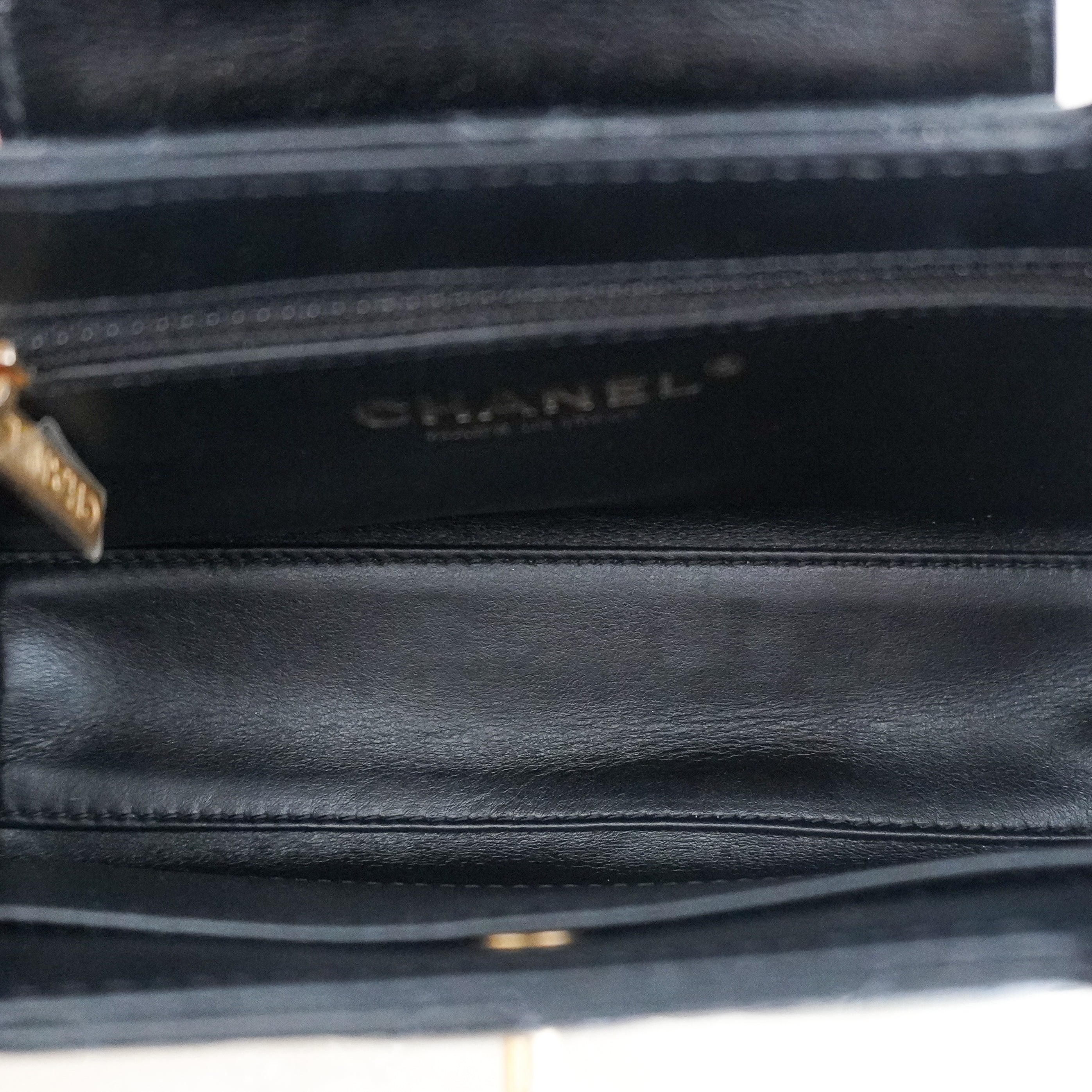 Chanel Small Kelly Re-Edition Top Handle Bag in Black Quilted Lambskin RRP (£4080) | Authentic Preloved
