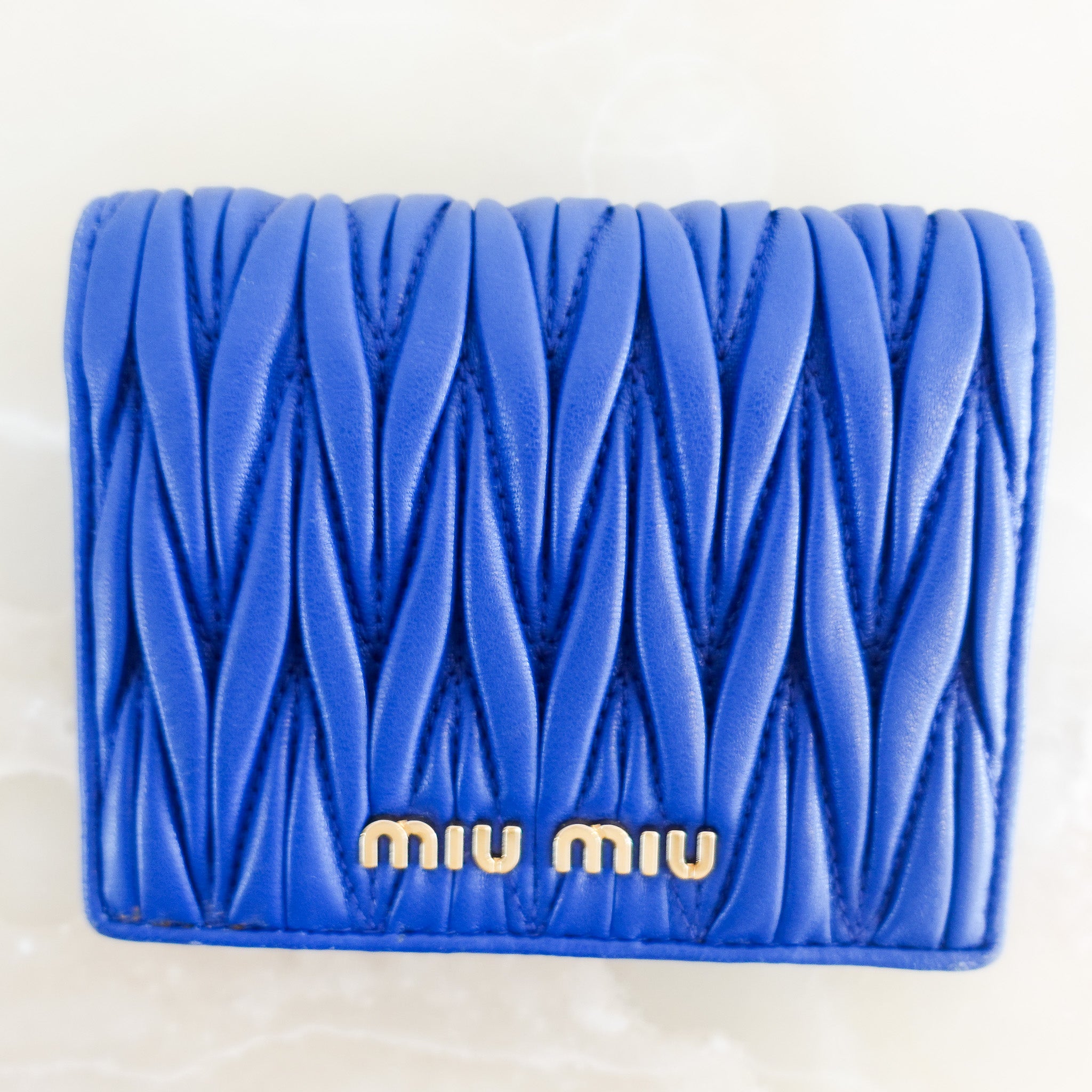 NEW Miu Miu Azzuro Blue Small Matelasse Portaf Verticale Wallet RRP £480 | Authentic Preloved - Reloved Again