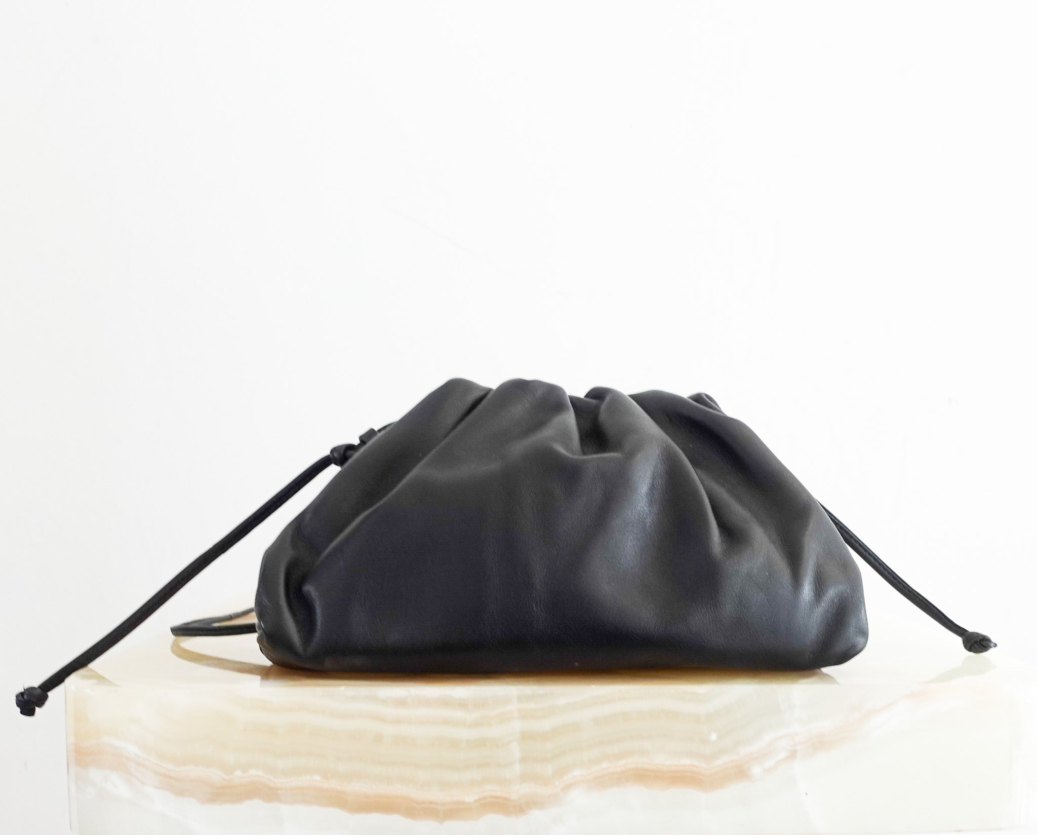 Mini pouch intrecciato leather clutch RRP £1600