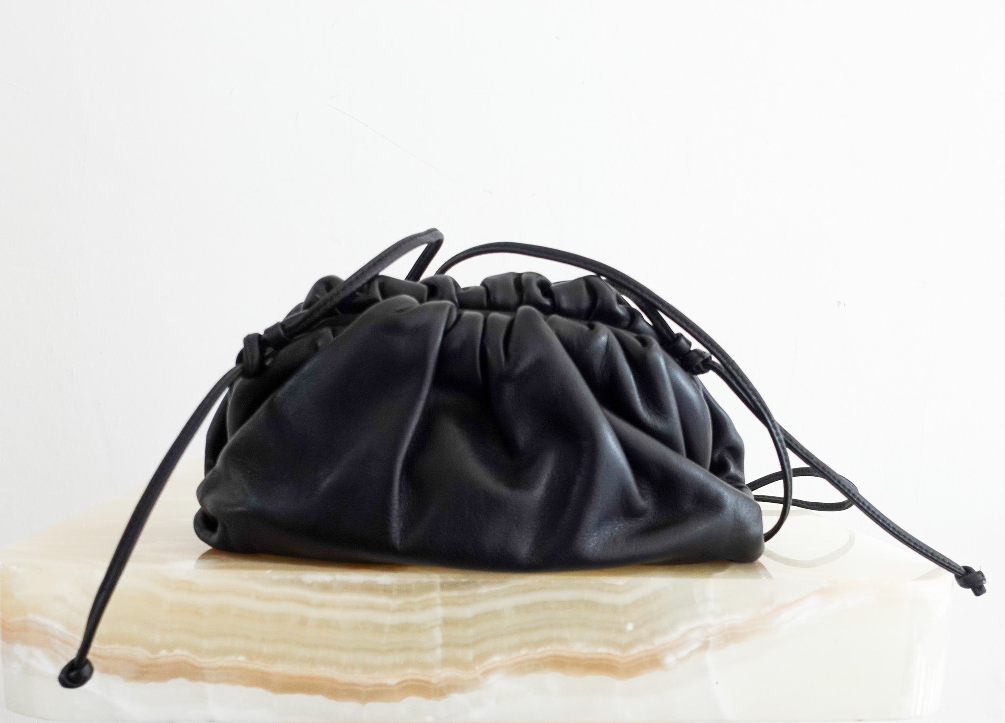 Mini pouch intrecciato leather clutch RRP £1600