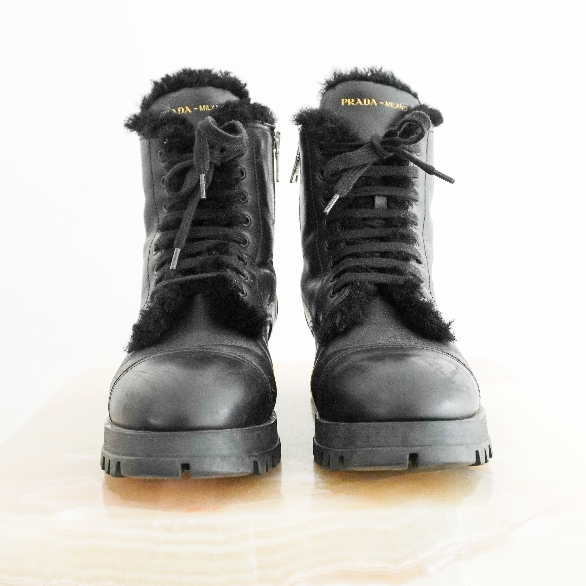 Prada Brixxen Combat Leather Booties with Shearling Fur (RRP £1350) | Authentic Preloved - Reloved Again