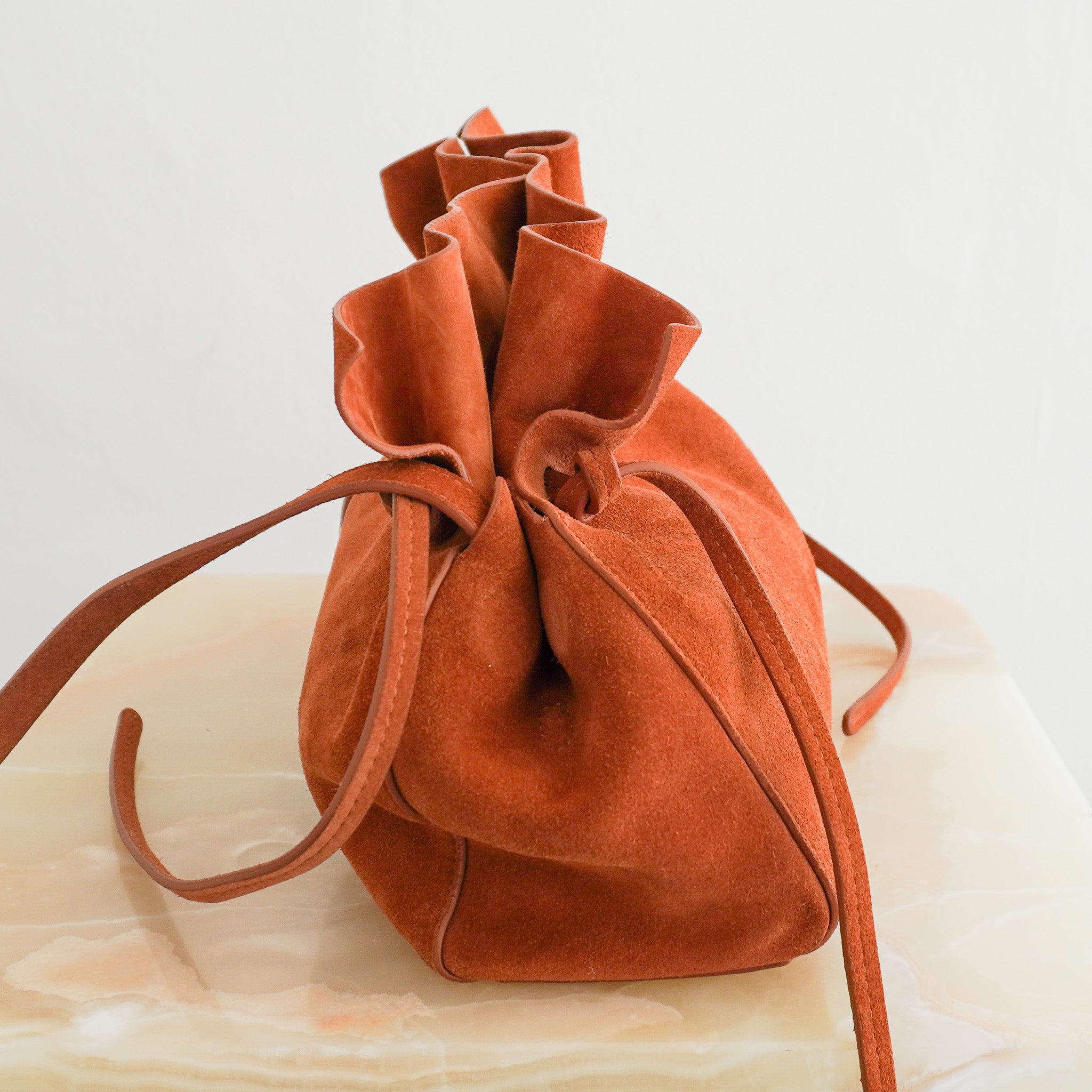 Mansur Gavriel Suede Drawstring Crossbody Bag Rust Leather | Authentic Preloved - Reloved Again