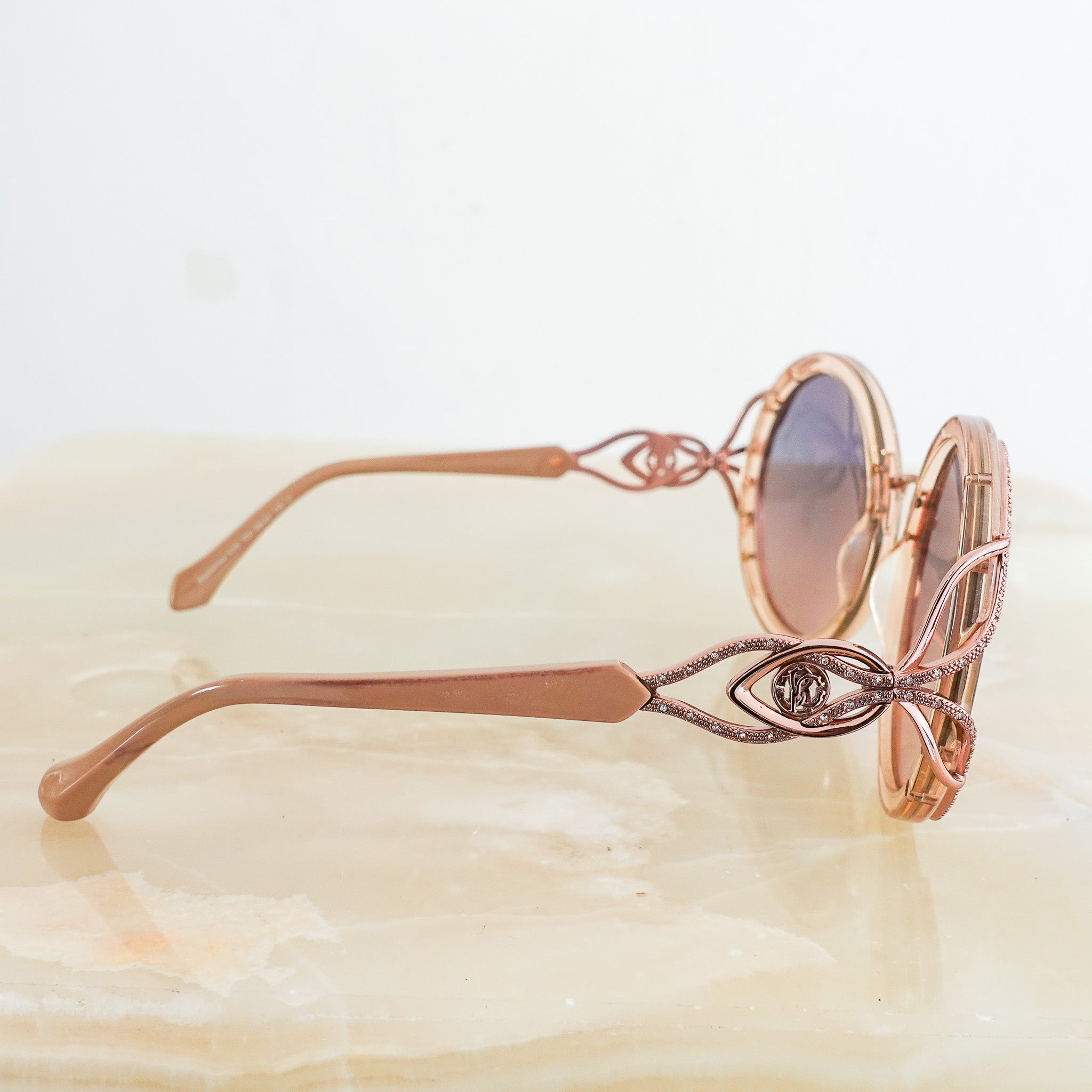 Round rose sunglasses RRP £125