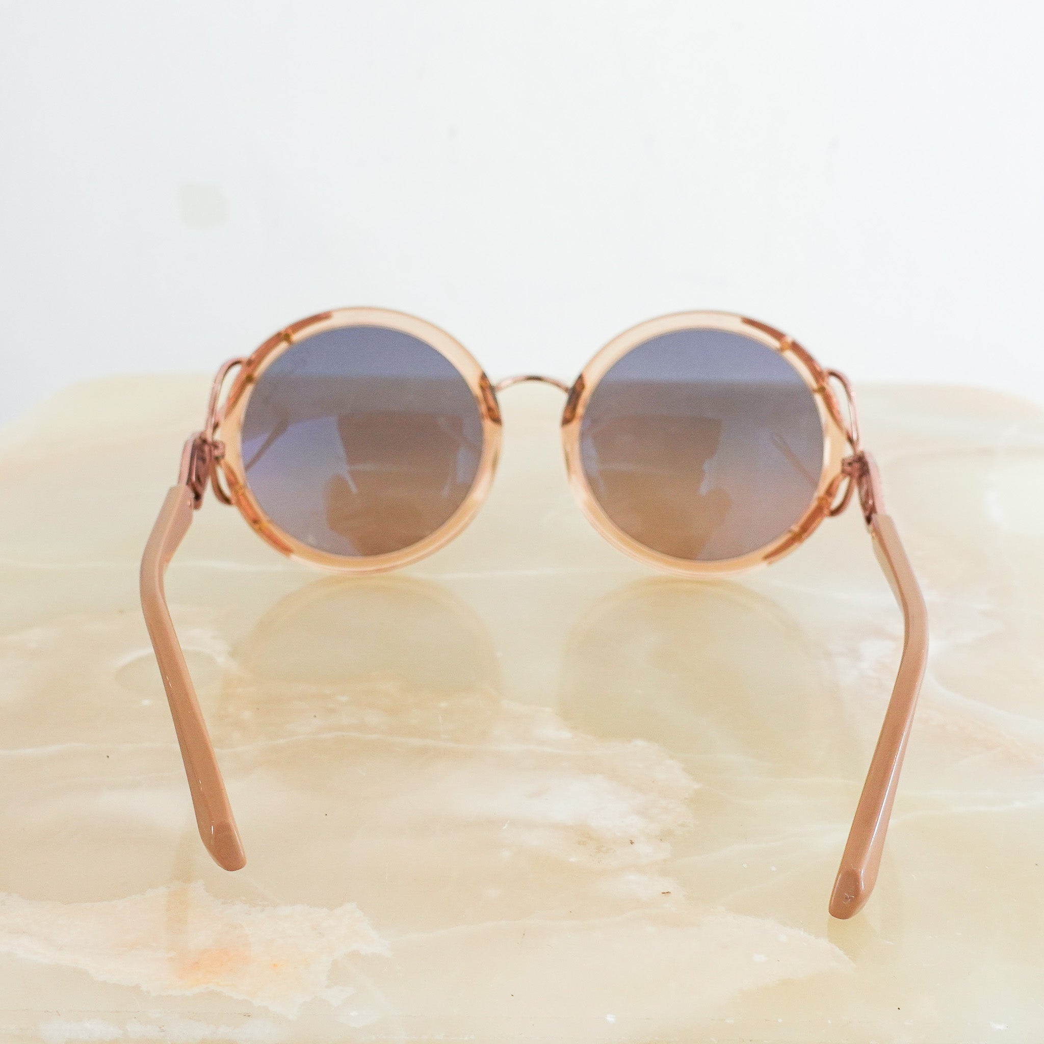Round rose sunglasses RRP £125