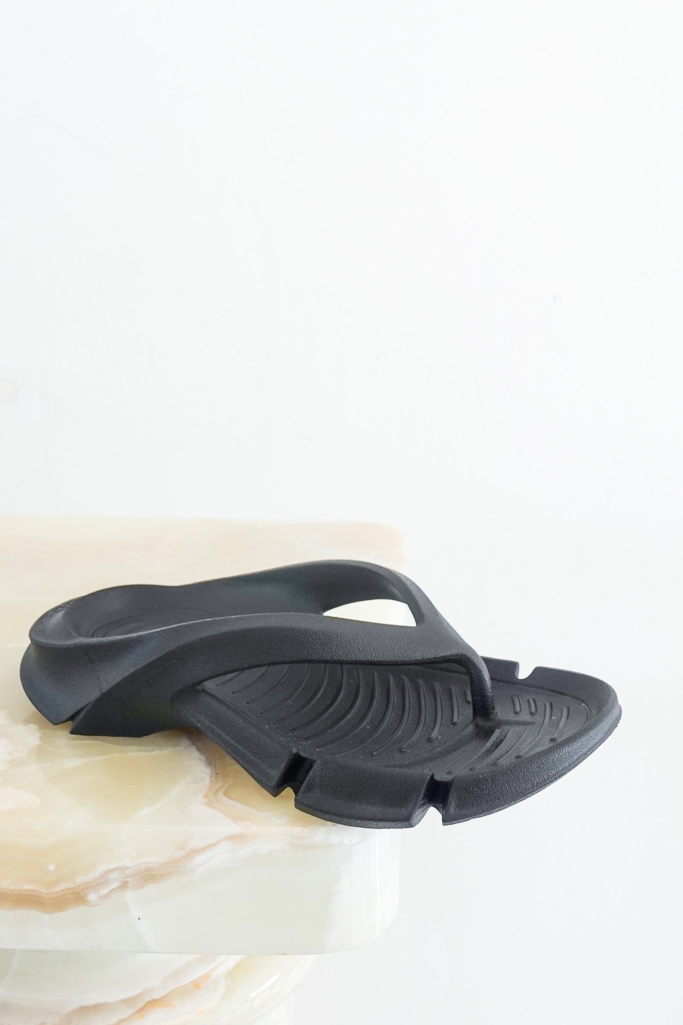 Black flip flops RRP £330