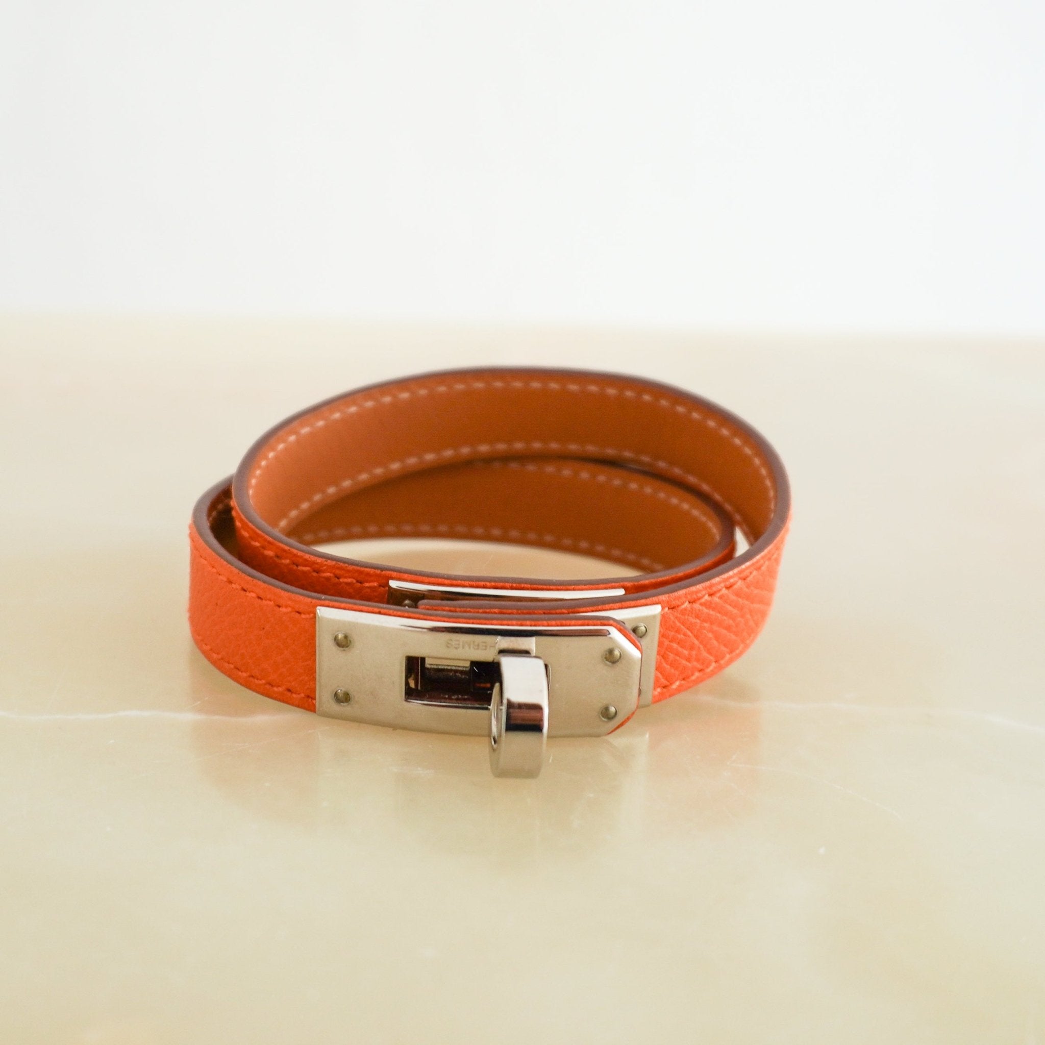 Hermès Kelly Double Tour Bracelet in Feu Epsom Leather and Palladium Hardware (RRP £445) | Authentic Preloved - Reloved Again