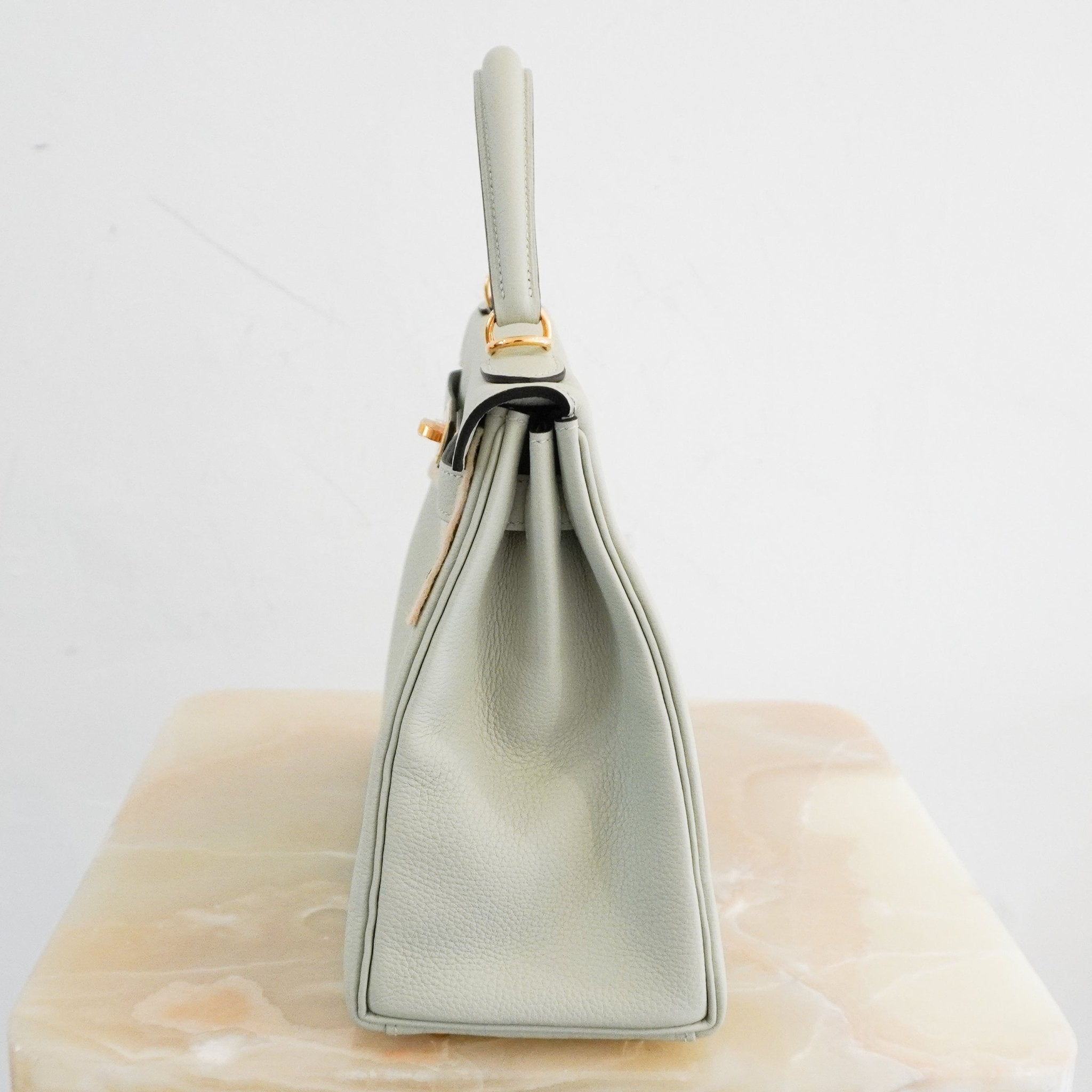 NEW Hermès Kelly 28 Gris Neve Togo Retourne Gold Hardware | Authentic Preloved - Reloved Again