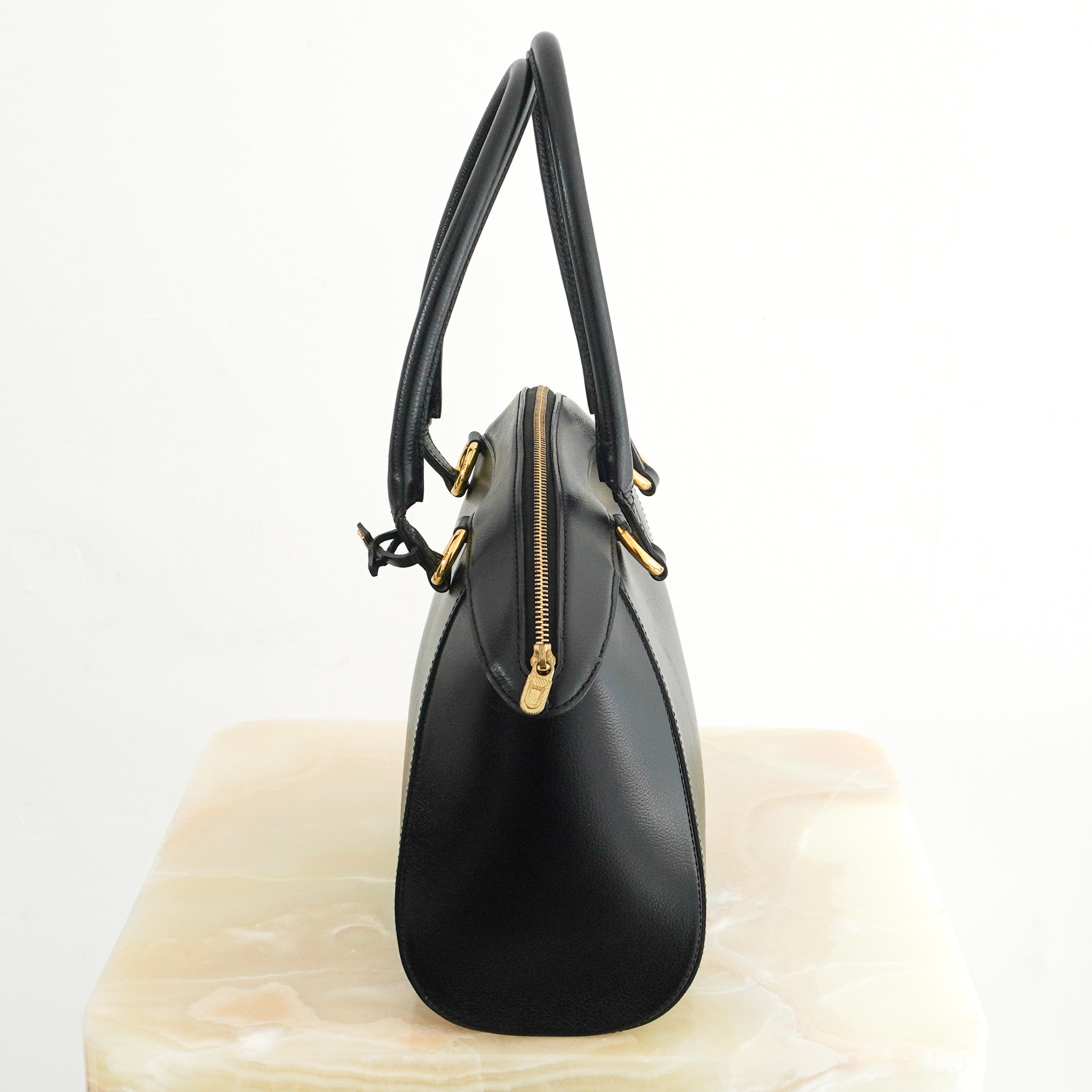 Delvaux Vintage Charme Bag in Black Jumping Calf Leather with Gold-Tone Hardware side photo chelsea london