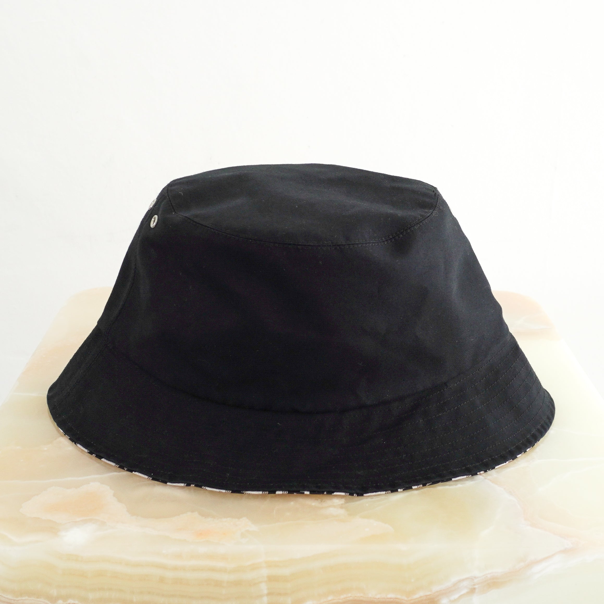 Dior Reversible Teddy-D Small Brim Bucket Hat in Black side photo chelsea london