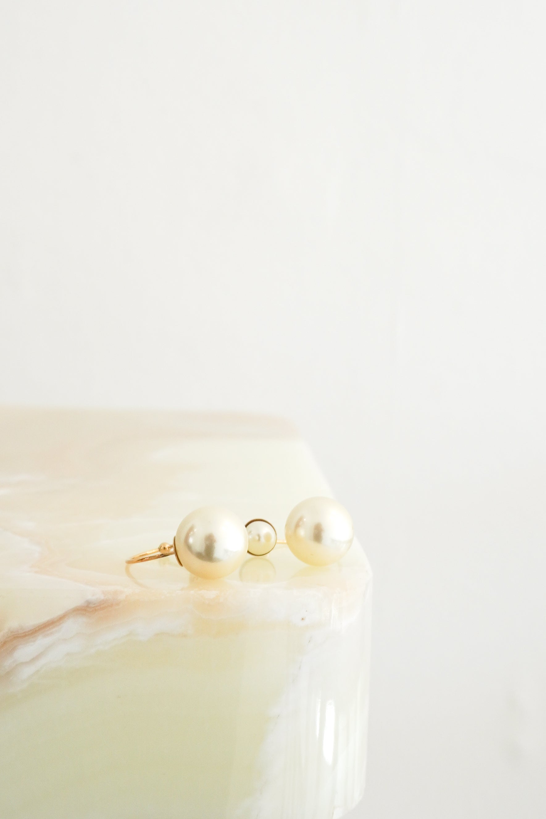 Dior UltraDior Tribales Gold-Tone Pearl Earrings front photo chelsea london