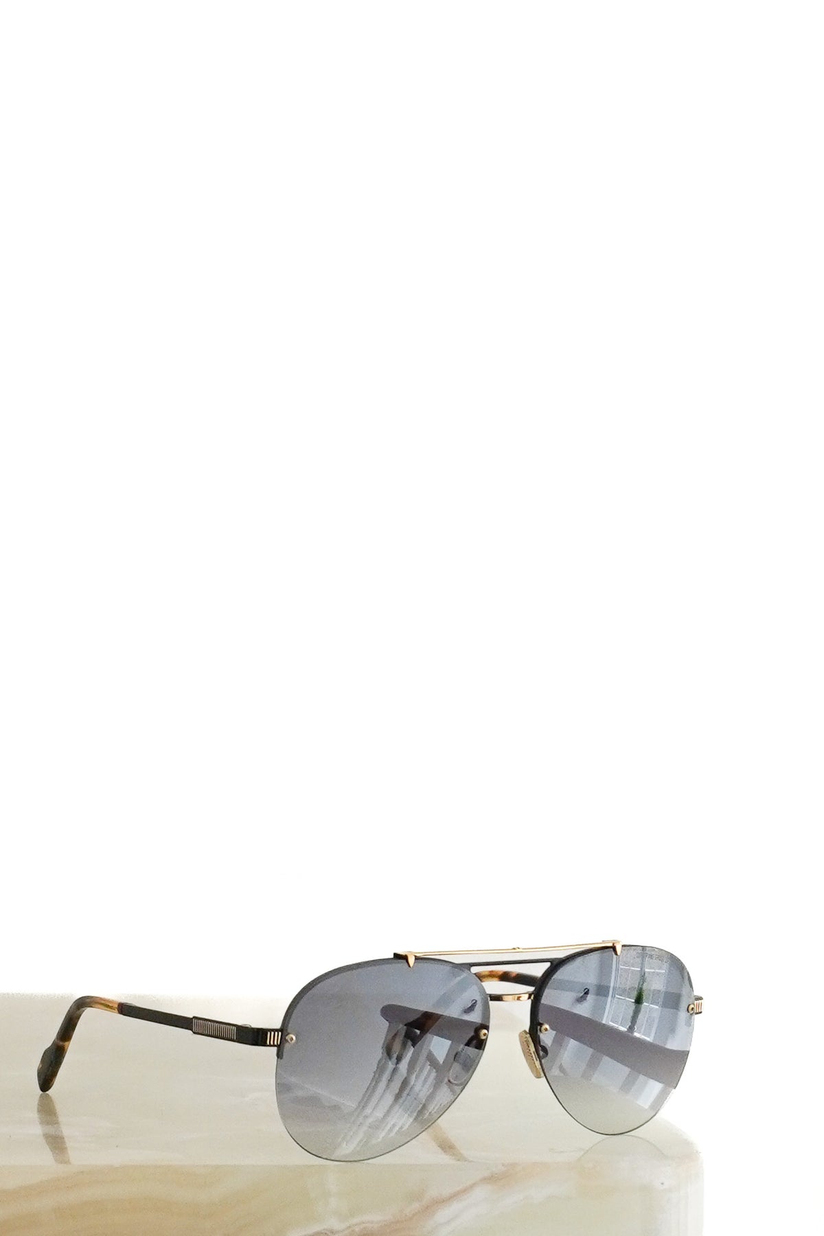 Front: Cutler and Gross Sunglasses