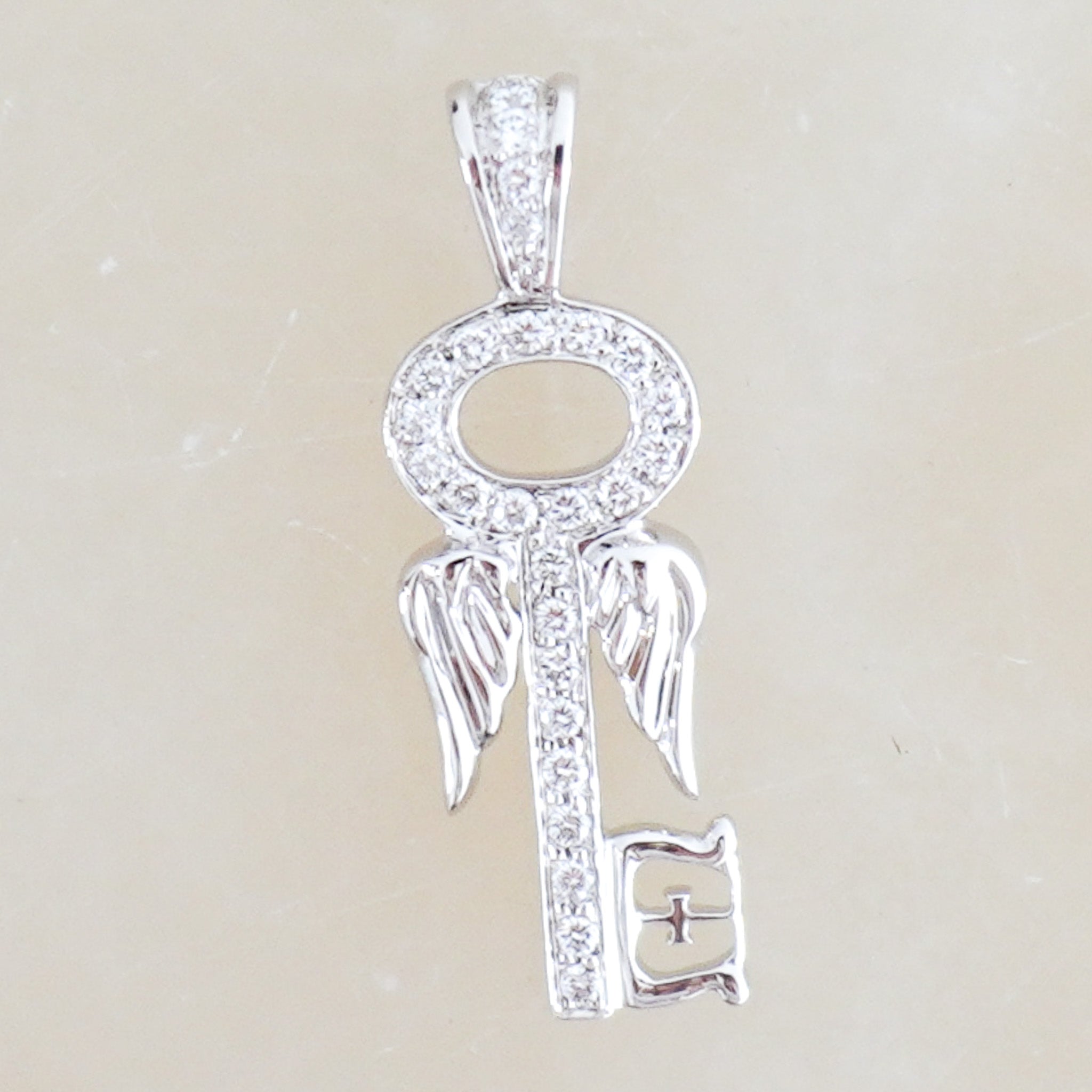 Front Image: Theo Fennell Diamond Key Charm Chelsea London