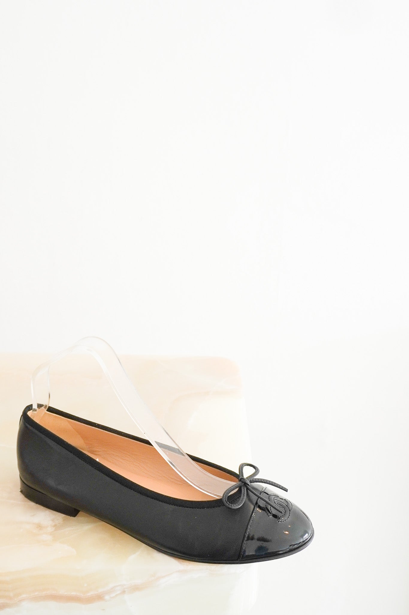 Front image of the CHANEL Black Cap-Toe Ballet Flats Chelsea London