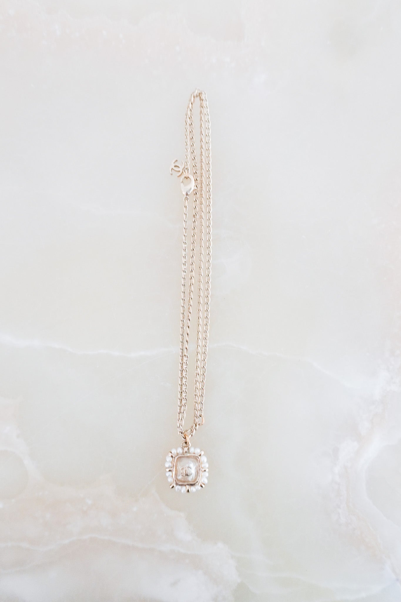 Front image of the Chanel Pearl & CC Pendant Necklace Chelsea London
