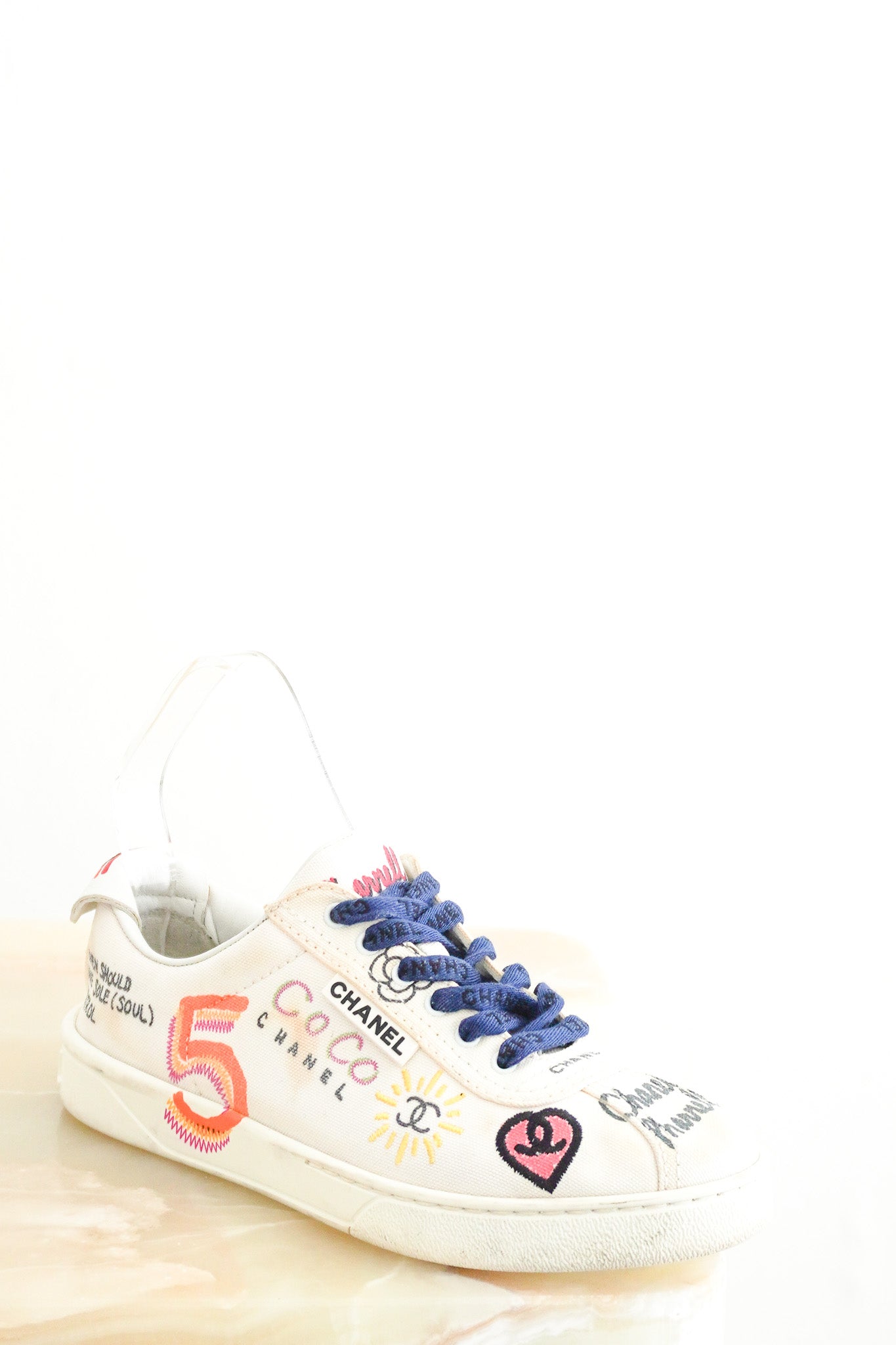 Front image of the Chanel x Pharrell White Multi Colour Sneakers Chelsea London