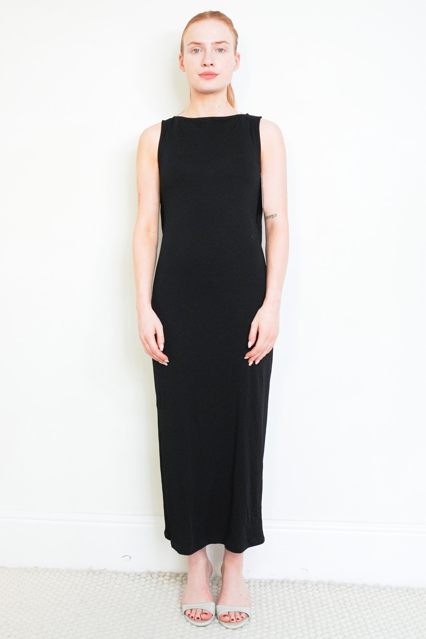 Front image of the Frame Black Open Back Midi Dress Sleeveless Draped Back Dress Chelsea London