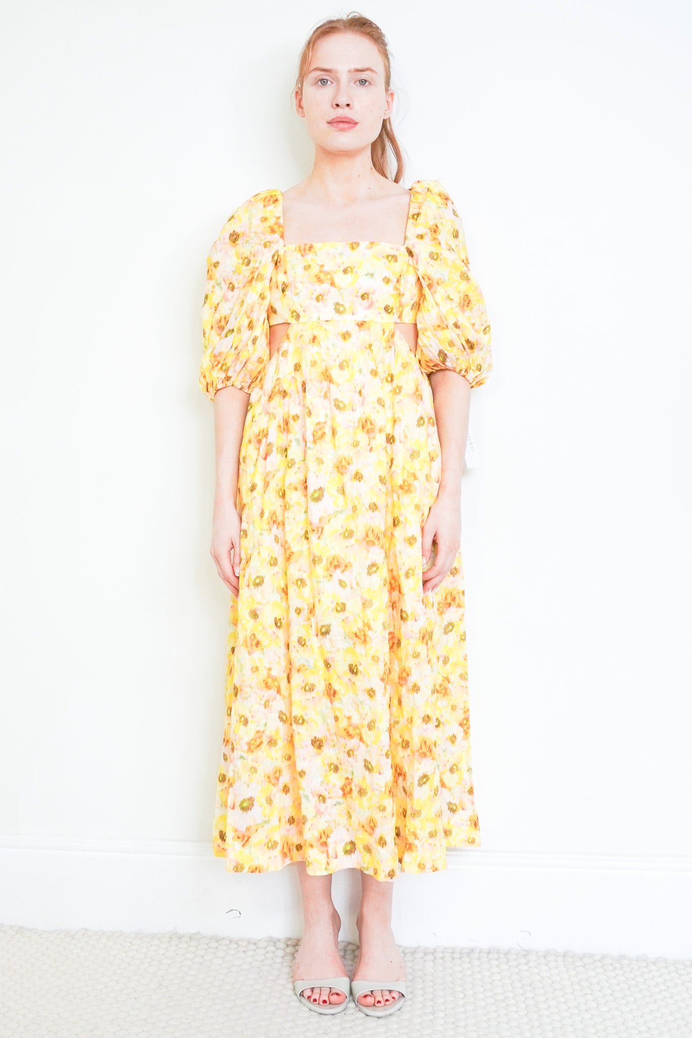 Front image of the Zimmermann Open Back Yellow Dress Chelsea London