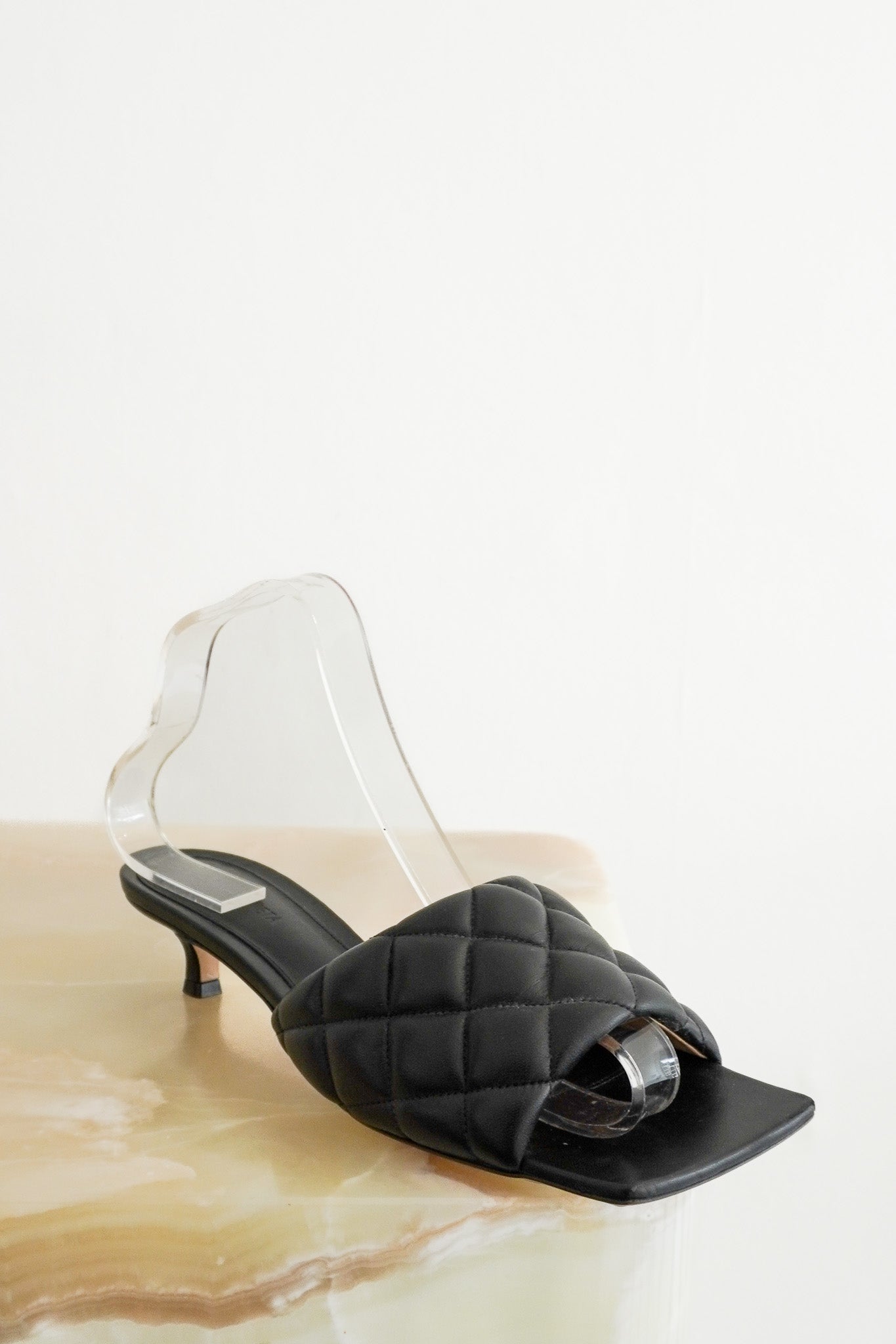 Front photo of the Bottega Veneta Black Mules Chelsea London