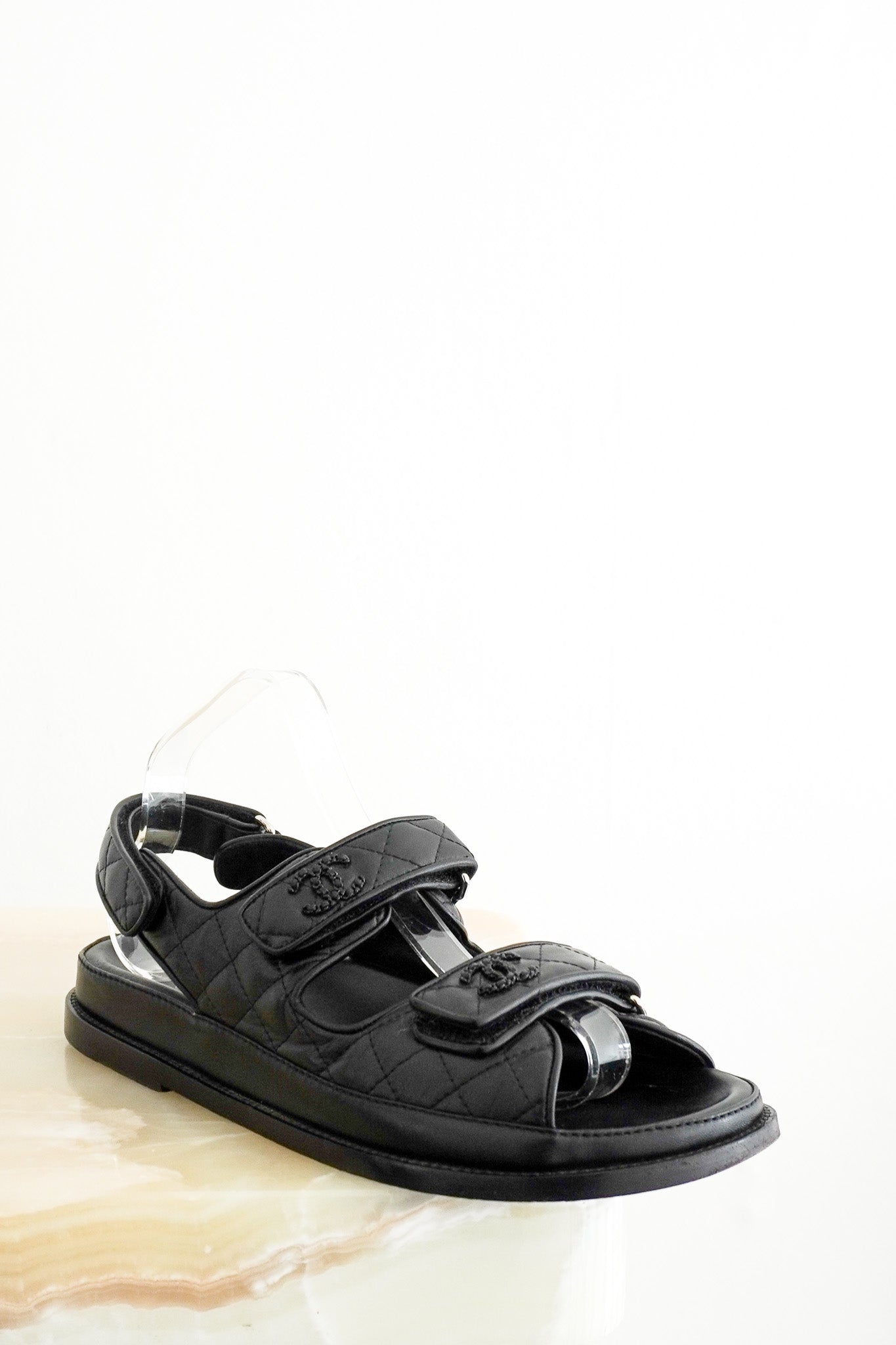 Front photo of the Chanel Black Quilted Leather Dad Sandals Chelsea London
