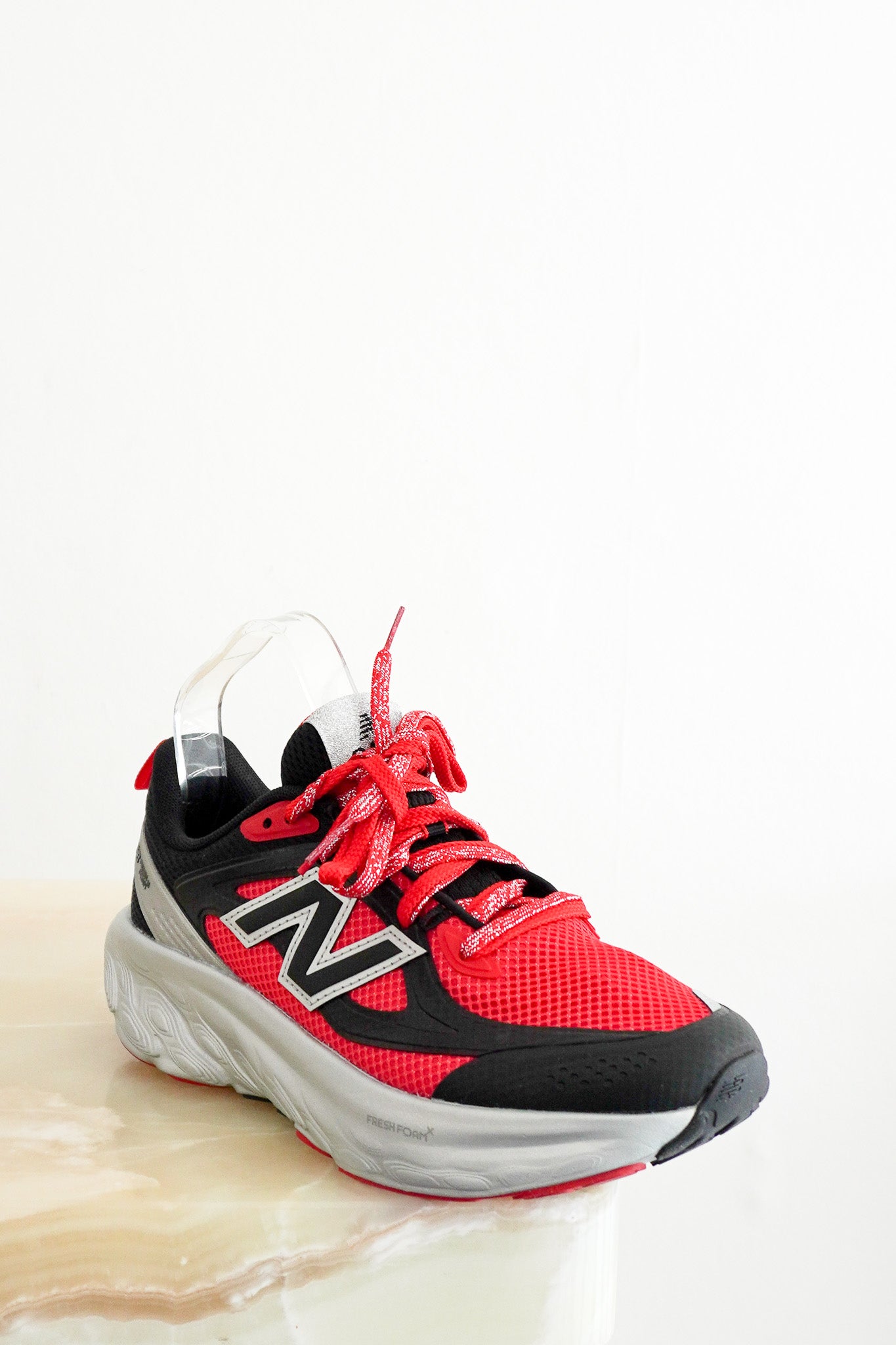 Front photo of the Ganni X New Balance Trainers in Red Chelsea London