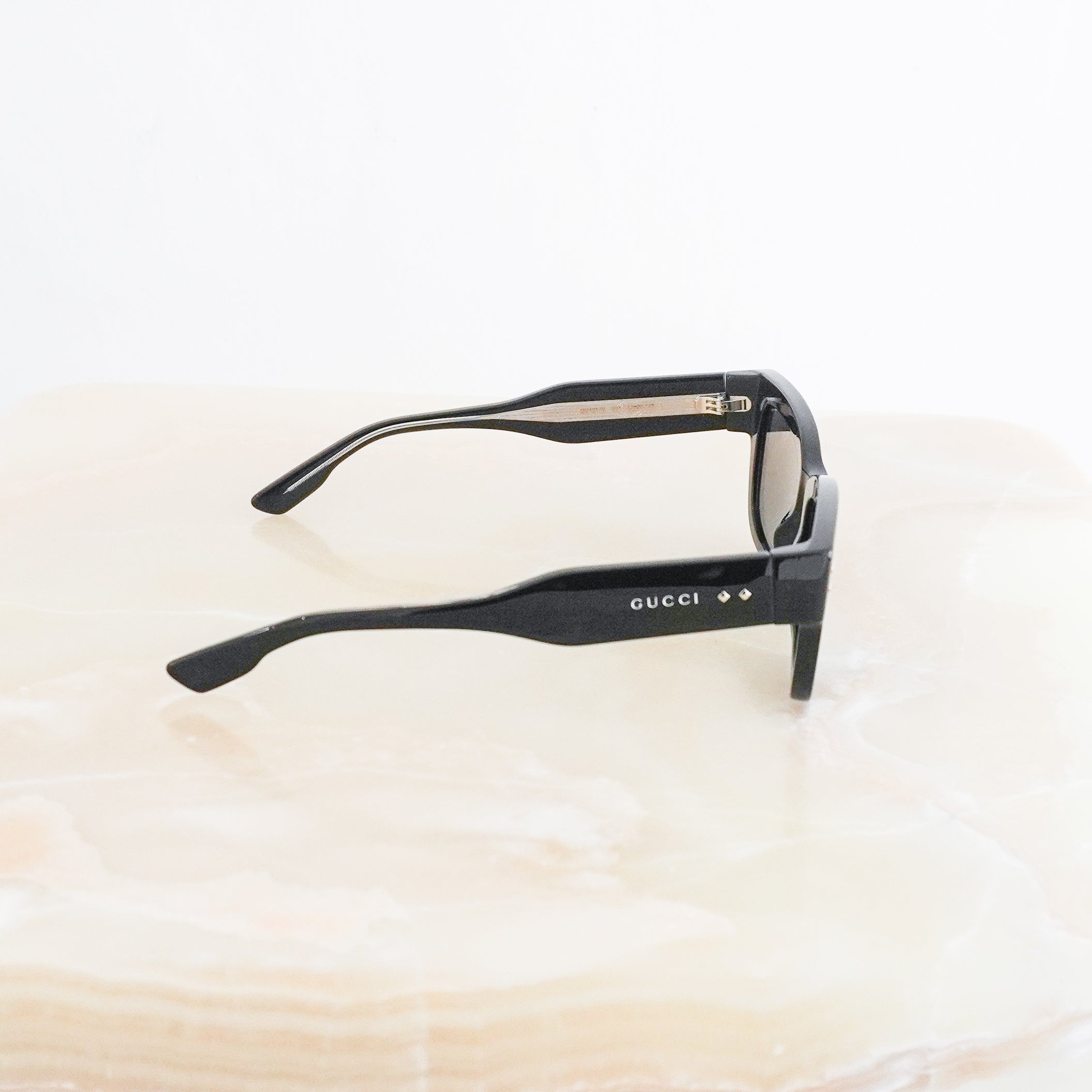 Gucci Black Rectangular Sunglasses GG1217S side photo chelsea london