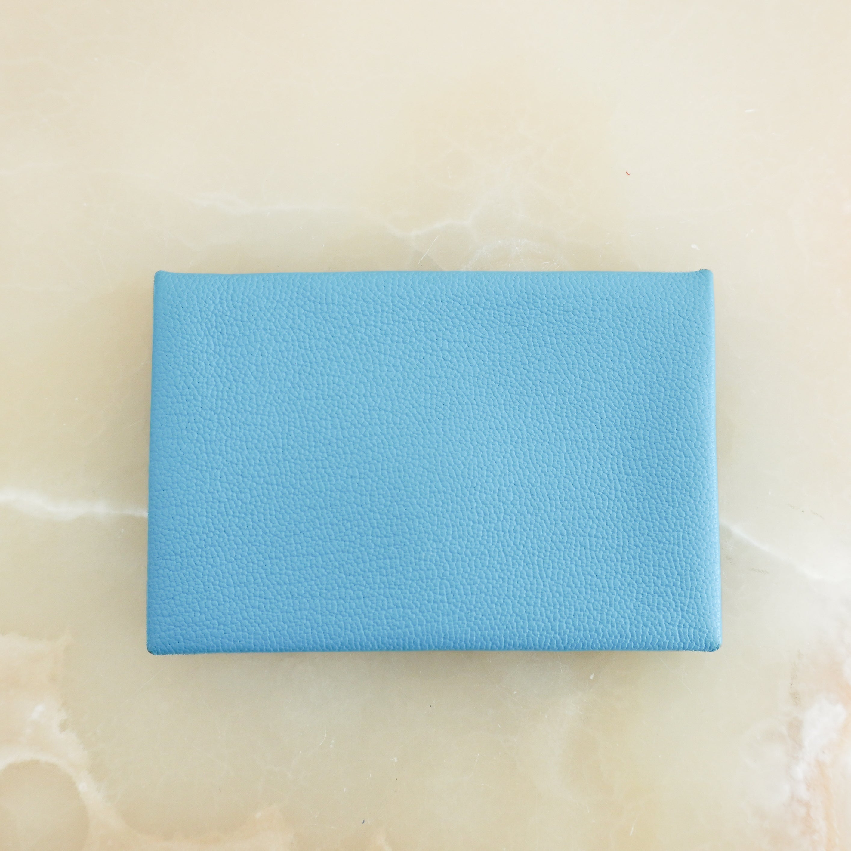Hermès Calvi Card Holder in Blue Chevre Mysore Leather back photo chelsea london