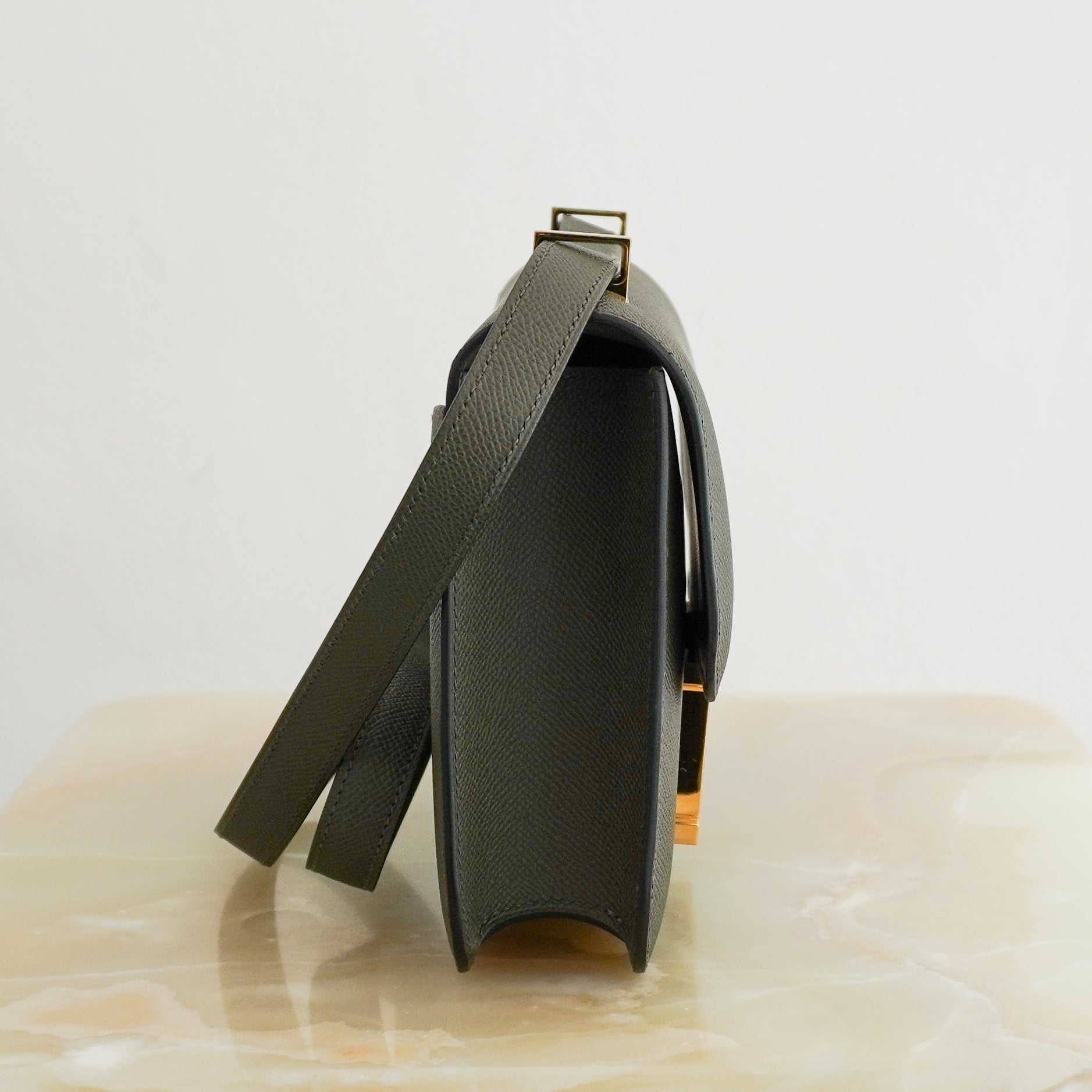 Hermès Constance 24 Epsom Leather Bag in Vert Gris with Gold Hardware side photo chelsea london